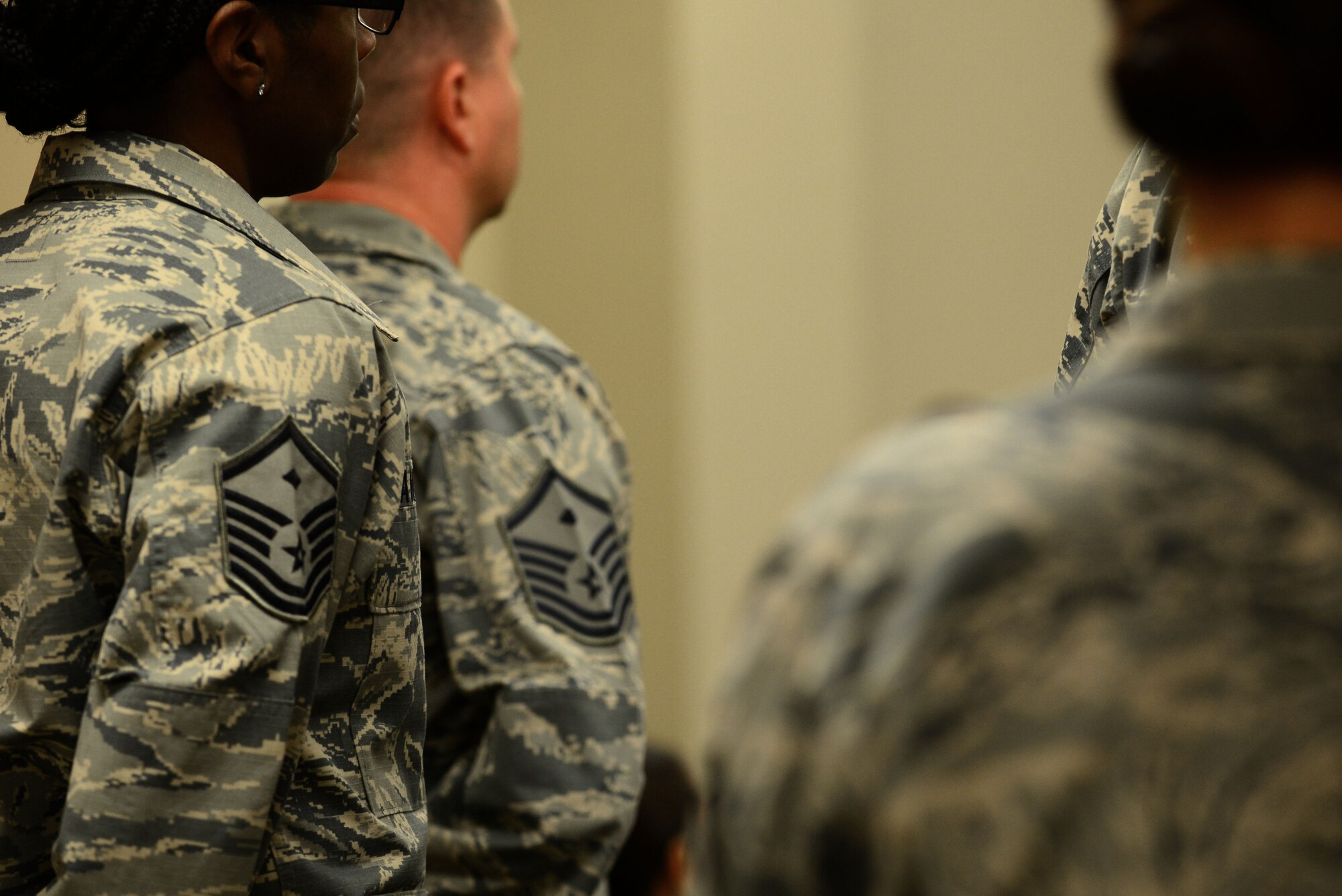 U.S. Air Force first sergeants listen to attendees during a First Sergeant's Symposium at Langley Air Force Base, Va., Sept. 15, 2015.  The symposium aimed to teach noncommissioned officers and senior noncommissioned officers the importance and responsibilities of being an Air Force first sergeant. (U.S. Air Force photo by Senior Airman Kimberly Nagle/Released)
