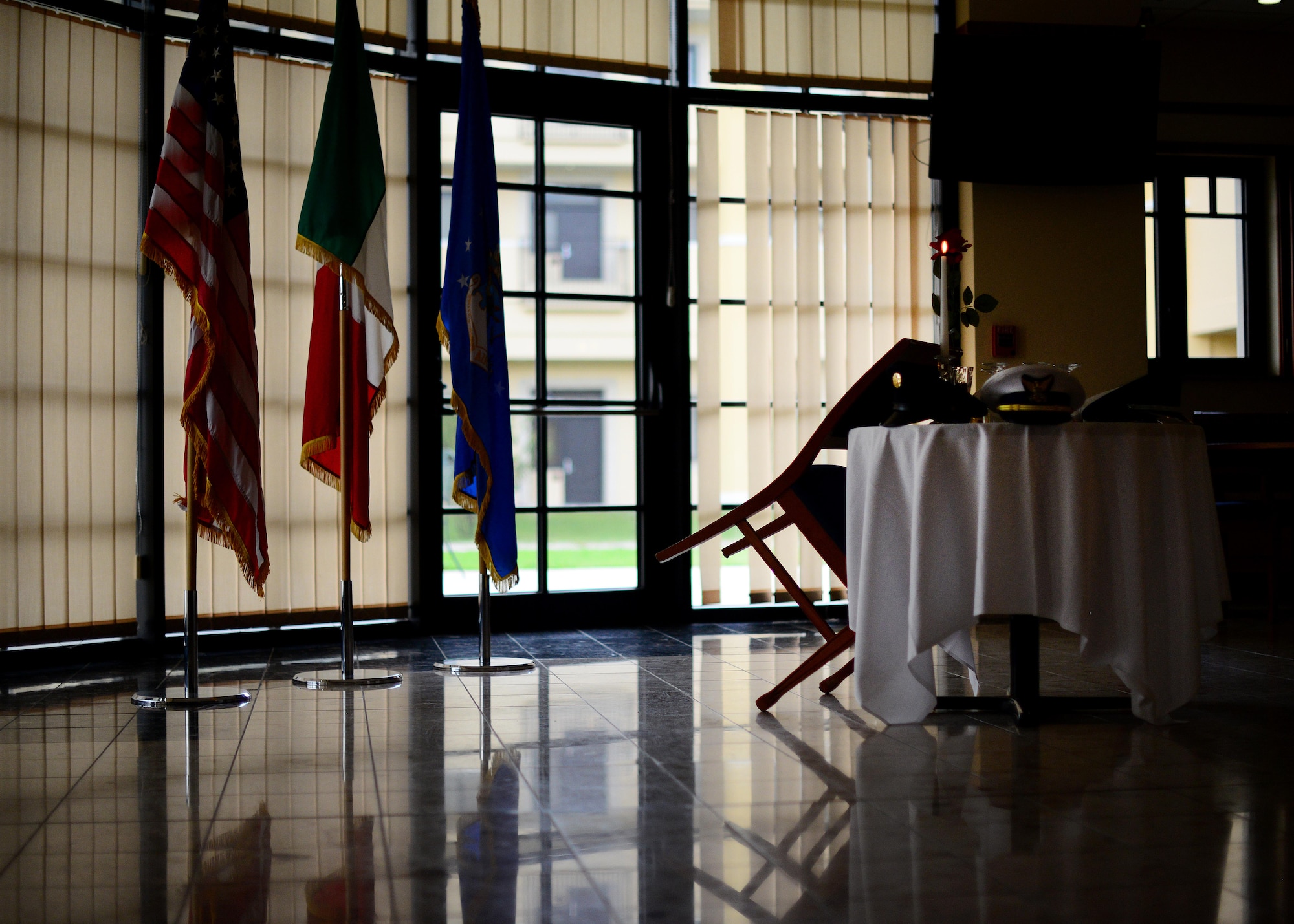 The Missing Man Table is displayed in honor of prisoners of war and those missing in action, Sept. 15, 2015, at Aviano Air Base, Italy. According to the Defense POW/MIA Accounting Agency, there are still 83,114 service members, since World War II, who are unaccounted for. (U.S. Air Force photo by Staff Sgt. Evelyn Chavez/Released)