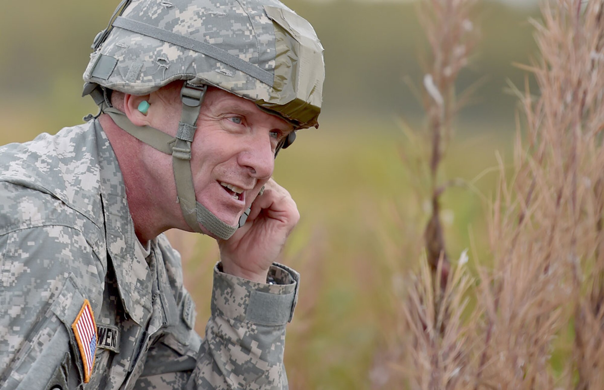 U.S. Army Alaska Commanding General Army Maj. Gen. Bryan Owens tightens his helmet strap after conducting an airborne operation from a CH-47 Chinook helicopter over Malemute drop zone on Joint Base Elmendorf-Richardson, Alaska, Sept. 10, 2015.  USARAK is a central component to the Army’s rebalance to the Pacific, providing two fully mission-ready Brigade Combat Teams ready to position unit elements anywhere across the Pac-Rim within 18 hours notice, and is uniquely positioned within nine-hours flight time from 90 percent of the world’s most highly-populated regions. (U.S. Air Force photo/Justin Connaher)