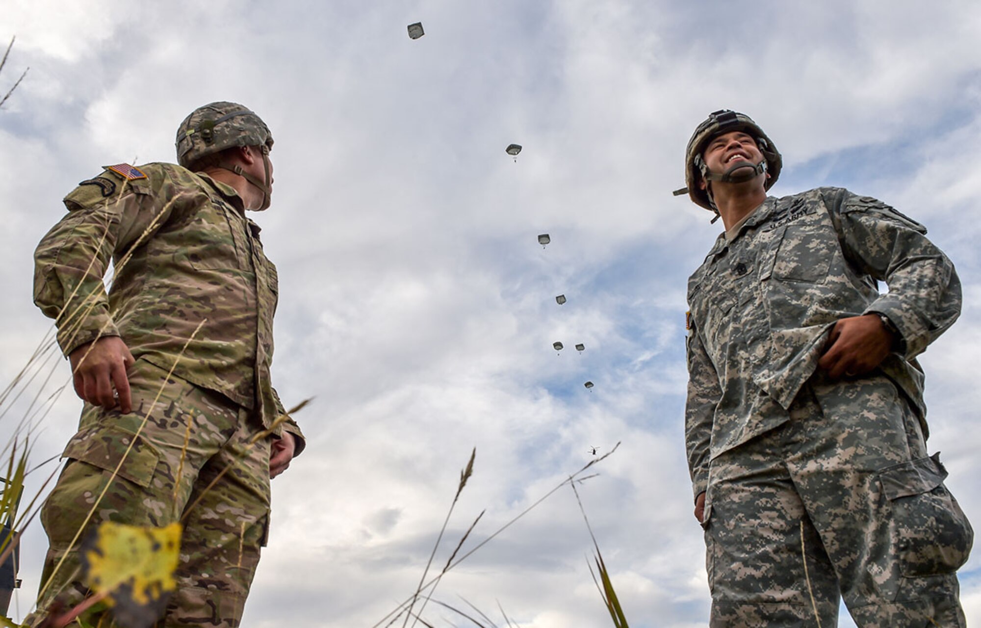Soldiers assigned to U.S. Army Alaska watch an airborne operation with USARAK Commanding General Army Maj. Gen. Bryan Owens from CH-47 Chinook helicopters over Malemute drop zone on Joint Base Elmendorf-Richardson, Alaska, Sept. 10, 2015.  USARAK is a central component to the Army’s rebalance to the Pacific, providing two fully mission-ready Brigade Combat Teams ready to position unit elements anywhere across the Pac-Rim within 18 hours notice, and is uniquely positioned within nine-hours flight time from 90 percent of the world’s most highly-populated regions. (U.S. Air Force photo/Justin Connaher)