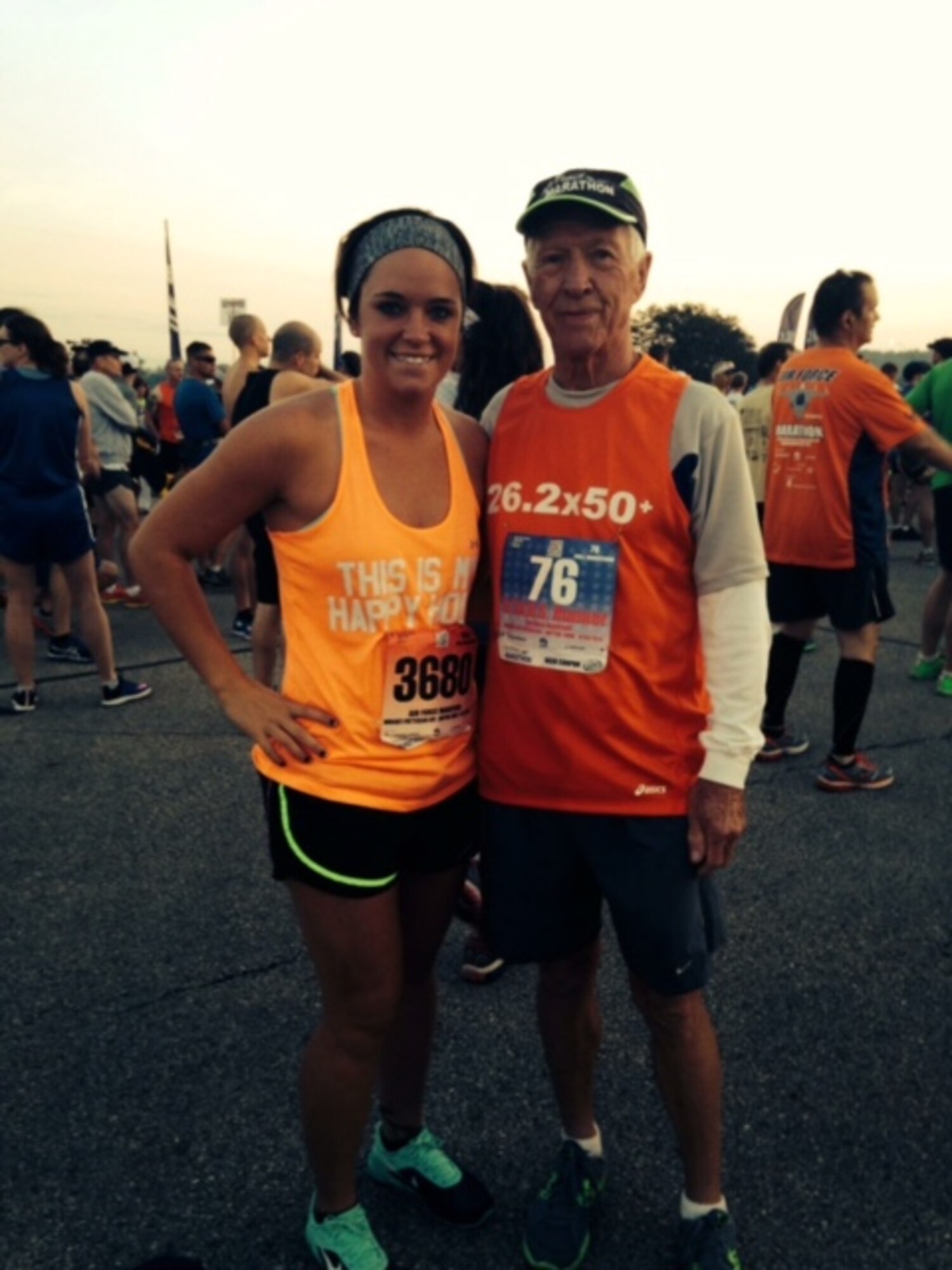 Senior Airman Mary Tarasiewicz, 39th Security Forces Squadron unit deployment manager, poses with her grandfather Don Tarasiewicz, before the 2014 Air Force Marathon Sept. 20, 2014, at Wright-Patterson Air Force Base, Ohio. This year will be the fourth time Mary has run the Air Force marathon with her grandfather. (U.S. Air Force photo by Senior Airman Michael Battles/Released)