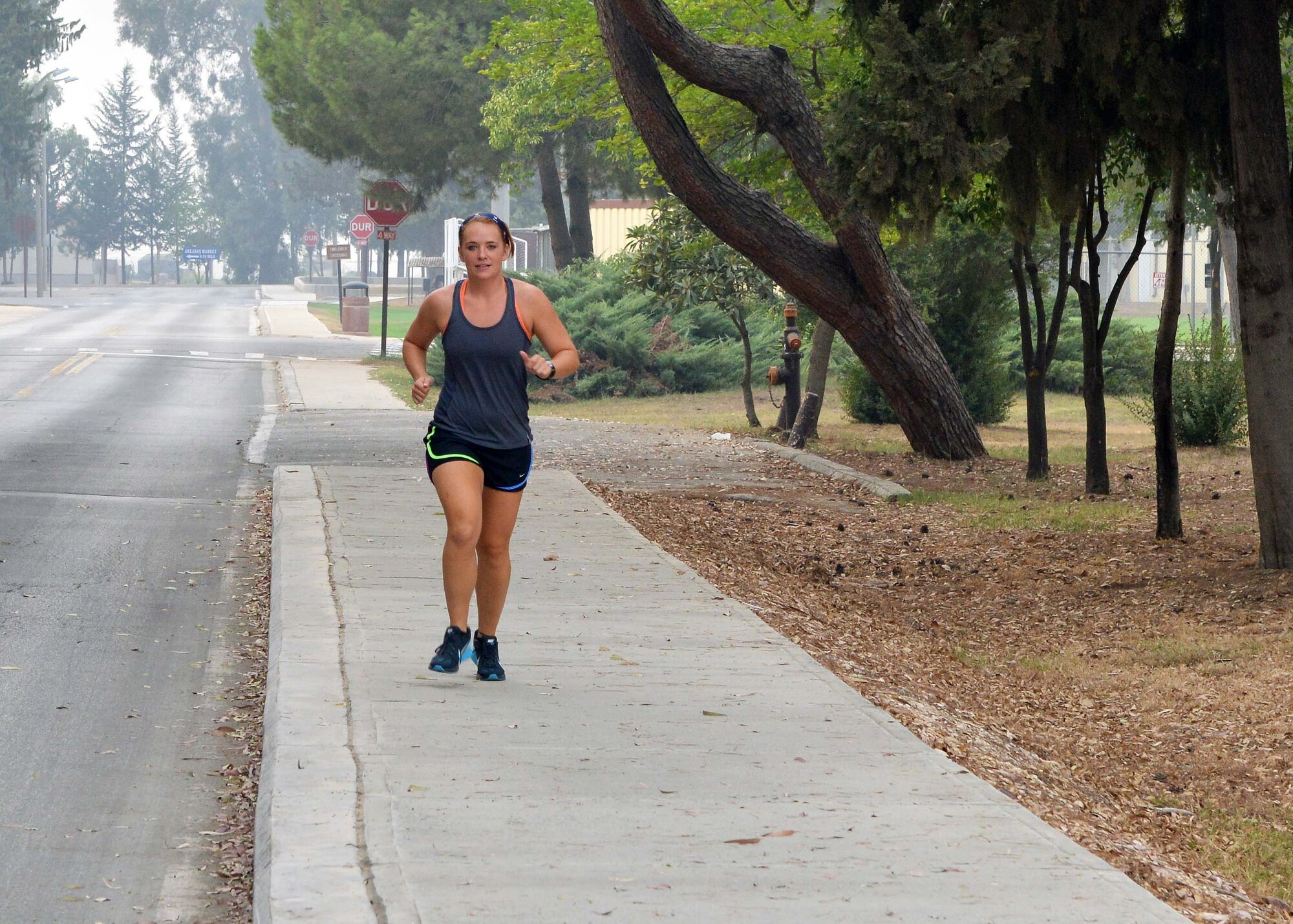Senior Airman Mary Tarasiewicz, 39th Security Forces Squadron unit deployment manager, runs as part of her 2015 Air Force Marathon training Sept. 9, 2015, at Incirlik Air Base, Turkey. This will be the fourth year Tarasiewicz runs the marathon with her grandfather. (U.S. Air Force photo by Senior Airman Michael Battles/Released)