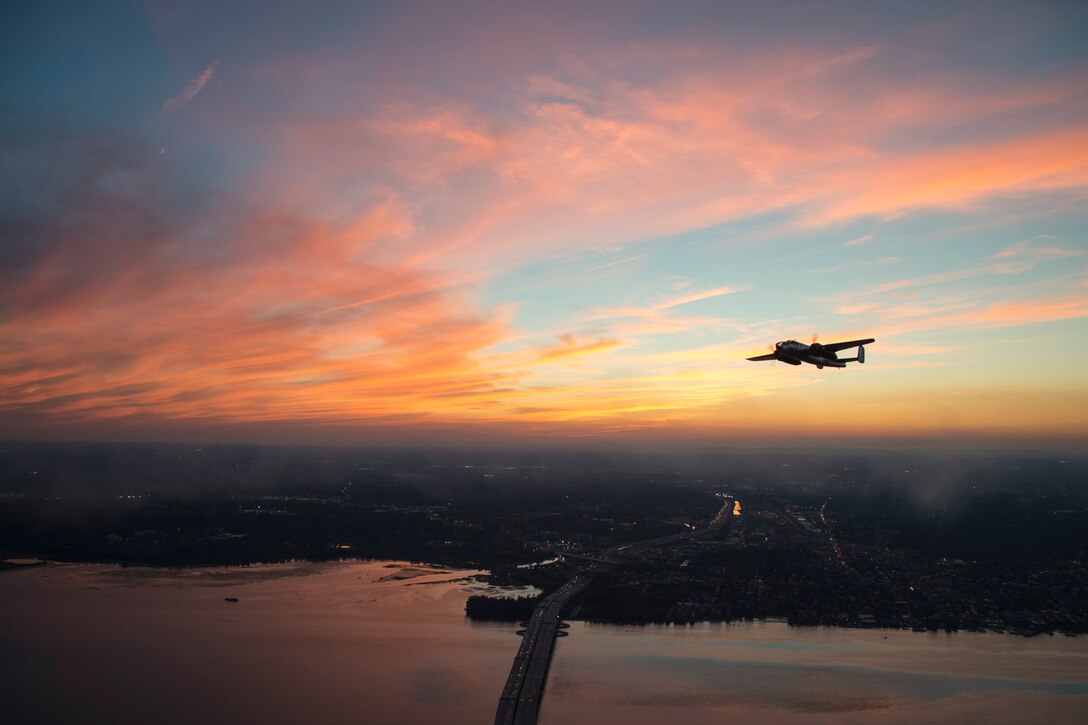 B-25 Mitchell flies over the Potomac River during a Military Tattoo on Joint Base Bolling-Anacostia, Washington, D.C., Sept. 16, 2015. The B-25 is part of the “Warbirds flight” and partaking in the Joint Base Bolling-Anacostia Tattoo and the Joint Base Andrews, Md., Airshow in celebration of the 68th U.S. Air Force birthday. (U.S. Air Force photo by Airman 1st Class Philip Bryant/Released)