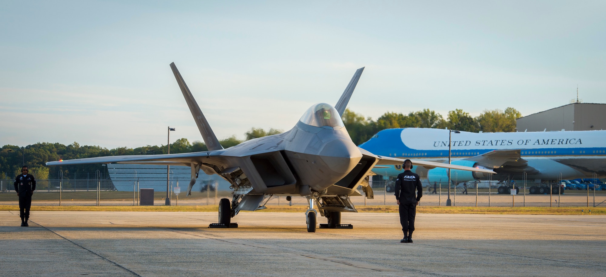 An F-22 Raptor on the Joint Base Andrews flightline prepares for takeoff before a flyover during a Military Tattoo held at Joint Base Anacostia-Bolling, Washington, D.C., Sept. 16, 2015. The F-22 Raptor was part of the “Heritage flight” along with a P-51 Mustang. (U.S. Air Force photo/Airman 1st Class Ryan J. Sonnier)
