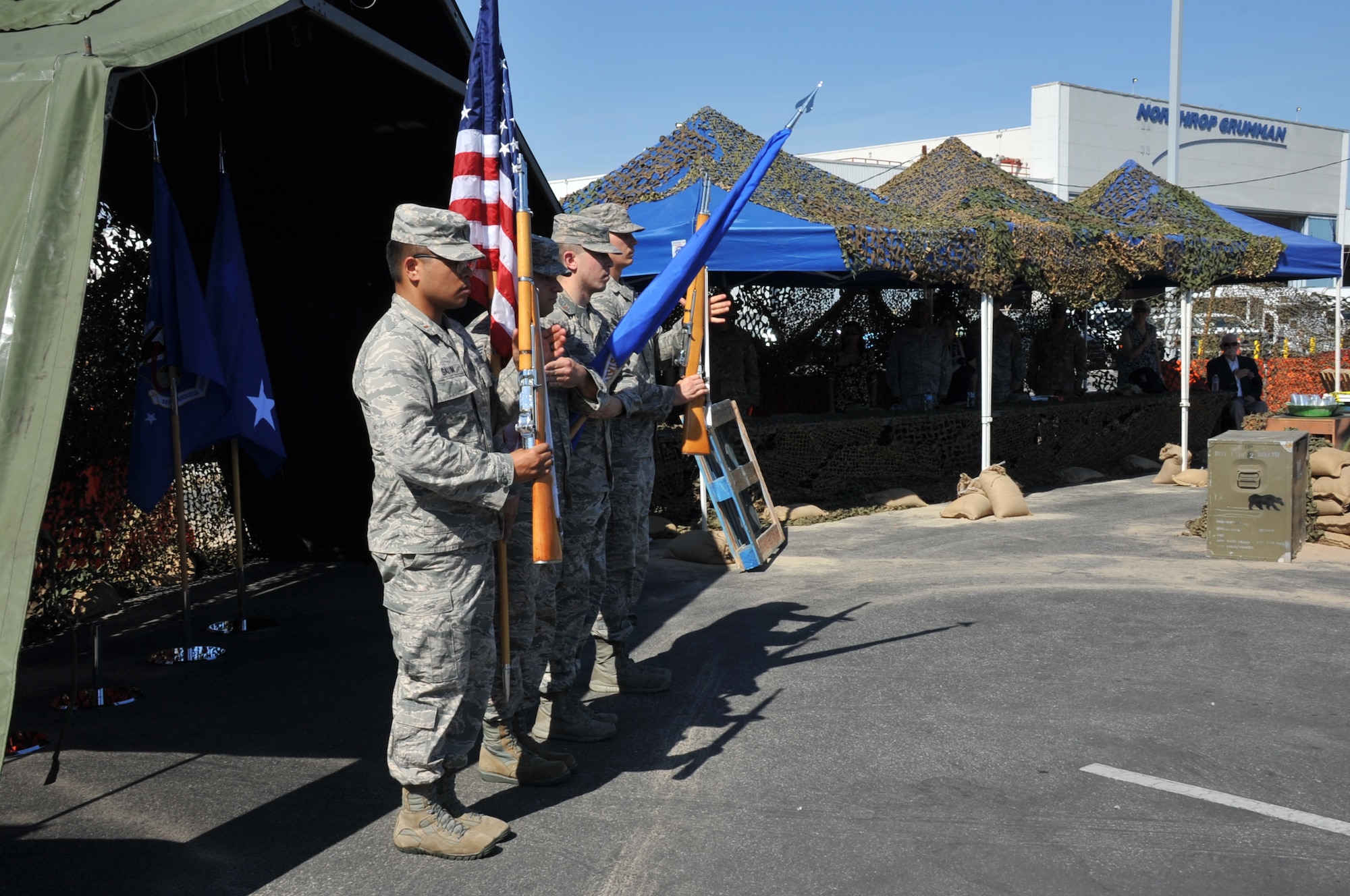 The Space and Missile Systems Center's Air Force Honor Guard perform a presentation of the colors during the official opening of the SMC Combat Dining-Out at Los Angeles Air Force Base in El Segundo, Calif. (U.S. Air Force photo/Sarah Corrice)