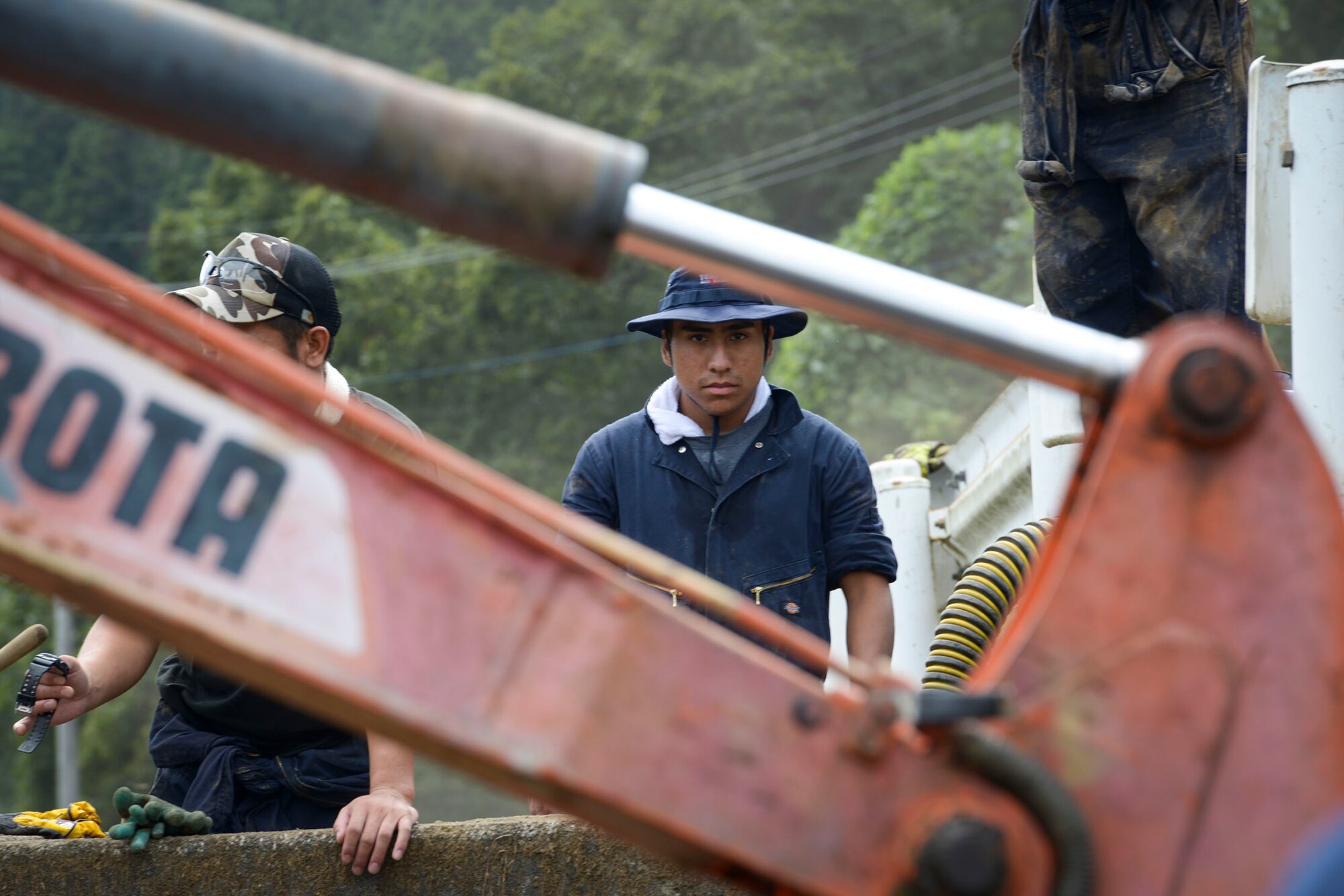 A 374th Civil Engineer Squadron fire protection member takes a break from digging
mud during flood relief at Kanuma City, Tochigi prefecture, Japan, Sept. 15, 2015. More
than 60 volunteers, Airmen and Japanese who work at Yokota Air Base, ventured to the
prefecture to help local residents restore their properties. Ten days of rain led to mass
flooding and many landslides that damaged personal and public property. (U.S. Air
Force photo by Staff Sgt. Cody H. Ramirez/Released)