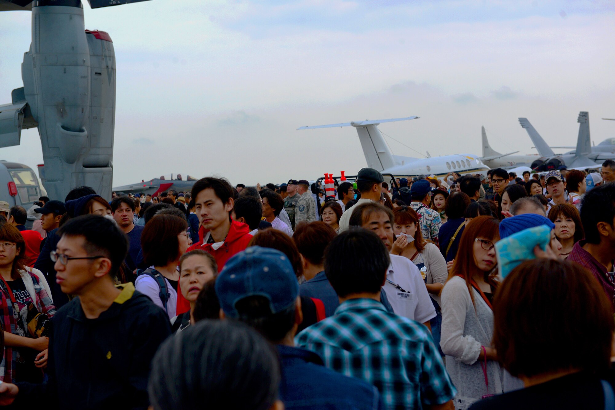 Despite the rainy weather more than 100,000 people came out to the Misawa Air Festival. The festival featured more than 30 static displays, live musical performances by the Pacific Air Forces Band Pacific Trends, several food booths and aerial demonstrations. (U.S. Air Force photo by Tech. Sgt. Melissa Mekpongsatorn/Released)