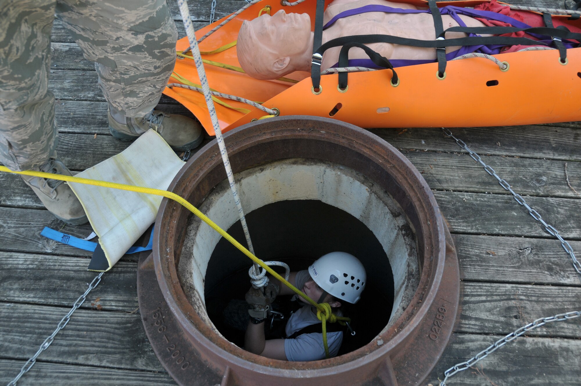 Staff Sgt. Jennifer Bristol participates in the 109th Fire Department's search and rescue team's confined space training at Stratton Air National Guard Base, New York, on Sept. 17, 2015. The 12-person search and rescue team trains monthly on various rescue techniques. (U.S. Air National Guard photo by Tech. Sgt. Catharine Schmidt/Released)