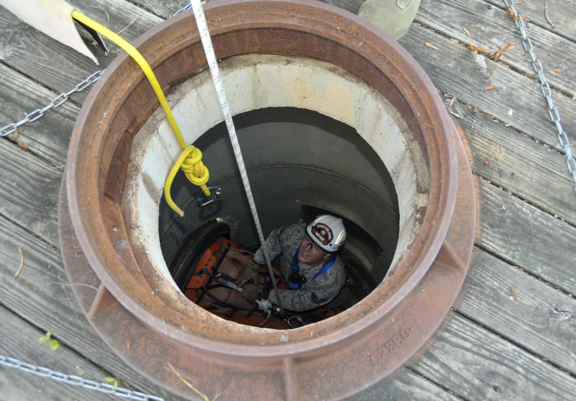 Staff Sgt. Christopher Meyer participates in the 109th Fire Department's search and rescue team's confined space training at Stratton Air National Guard Base, New York, on Sept. 17, 2015. The 12-person search and rescue team trains monthly on various rescue techniques. (U.S. Air National Guard photo by Tech. Sgt. Catharine Schmidt/Released)