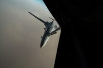 A U.S. Air Force B-1 Bomber receives fuel from an Air National Guard KC-135 Stratotanker that is deployed to the 340th Expeditionary Air Refueling Squadron at Al Udeid Air Base, Qatar over Iraq September 16, 2015. (U.S. Air Force photo/Staff Sgt. Alexandre Montes)  