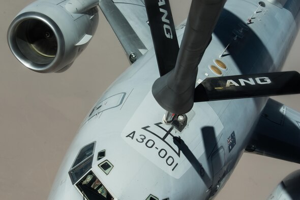 A Royal Australian Air Force E-7A Wedgetail receives fuels from an Air National Guard KC-135 Stratotanker that is deployed to the 340th Expeditionary Air Refueling Squadron at Al Udeid Air Base, Qatar over Iraq September 16, 2015. (U.S. Air Force photo/Staff Sgt. Alexandre Montes)  