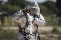 First Lt. Clayton Schmitt, a 902nd Security Forces Squadron operations officer, shoots a stream of water from a fire hose during the 2015 Battle of the Badges Sept. 12, 2015, at Joint Base San Antonio-Randolph, Texas. This year’s Battle of the Badges included three main events: a tactical shooting challenge, firefighter combat challenge and fire truck pull. U.S. Air Force photo/Airman 1st Class Stormy Archer)