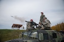Airman Jeffery Gibson, a 354th Security Forces Squadron response force member, fires a Mark-19 grenade launcher Sept. 9, 2015, at Eielson Air Force Base, Alaska. Members of the squadron must show proficiency annually to be qualified on the weapon. (U.S. Air Force photo/Staff Sgt. Shawn Nickel)