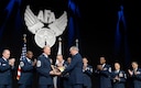 Chief Master Sgt. of the Air Force James A. Cody thanks Air Force Chief of Staff Gen. Mark A. Welsh III for his exceptional service by presenting him with an invitation to an Order of the Sword ceremony following his &quot;Enlisted Force Update&quot; at Air Force Association&#39;s Air and Space Conference and Technology Exposition, Sept. 16, 2015, in Washington, D.C.  (U.S. Air Force photo/Scott M. Ash)