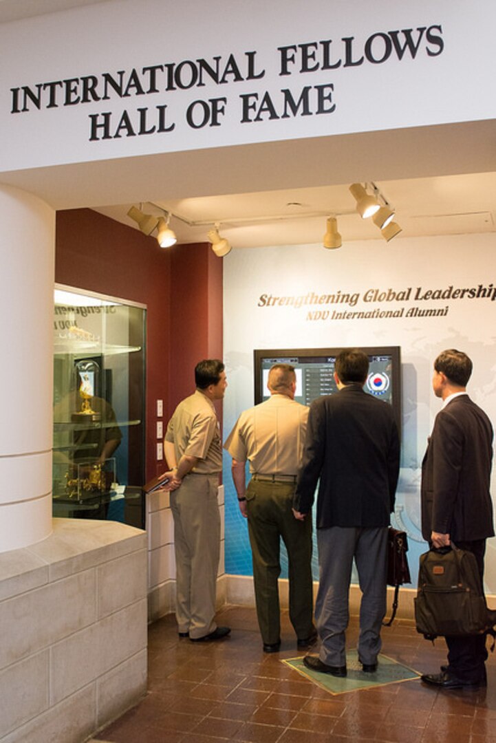 The Delegation headed by KNDU President Rear Admiral Kim Young Cheal Views the International Fellows Hall of Fame and Information Board