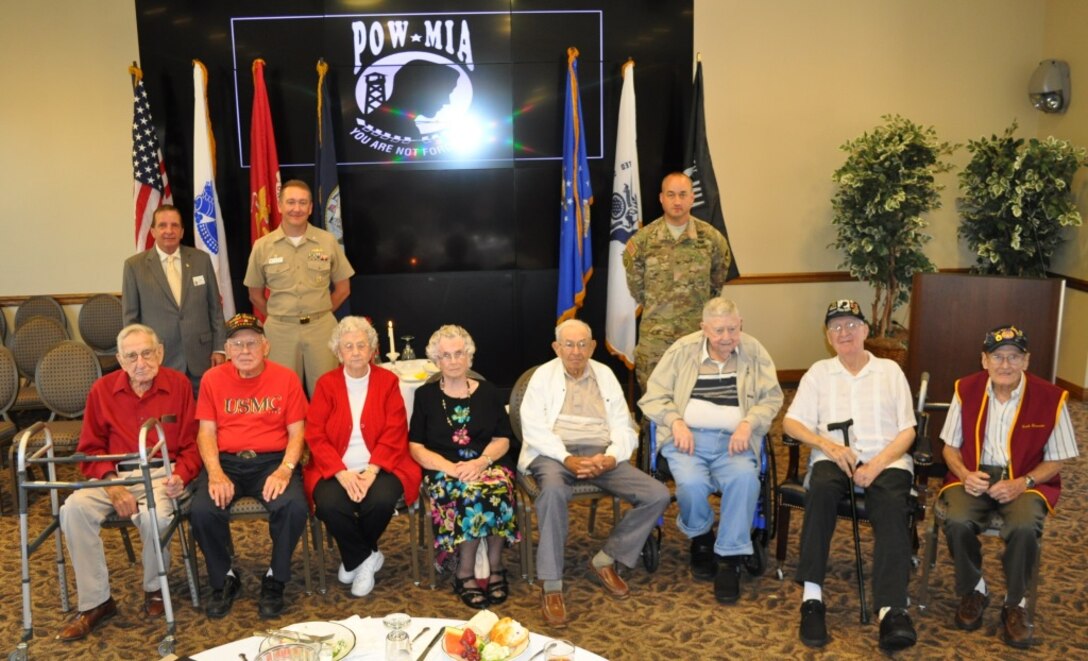 150917-N-JW847-003- (Back Row,L-R) Former Veterans of Foreign Wars of the United States Commander-in-Chief Bill Thien, NSA Crane Commanding Officer Cmdr. Timothy Craddock and CAAA Commander Col. Jim Hooper 

(Front Row, L-R) Former POW and POW widows Vernon Meyer, John Bowling, Pearl Bridgewater, Naomi Summerlot, John Frayser, Gene Saucerman, Paul Wagner and Frank Alexander
