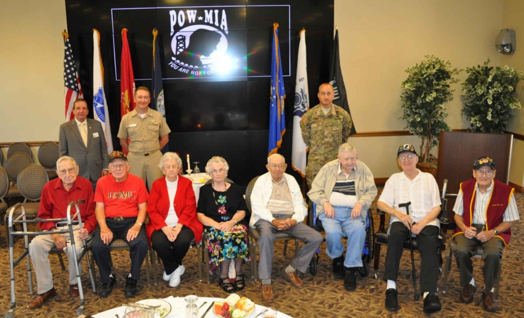150917-N-JW847-003- (Back Row,L-R) Former Veterans of Foreign Wars of the United States Commander-in-Chief Bill Thien, NSA Crane Commanding Officer Cmdr. Timothy Craddock and CAAA Commander Col. Jim Hooper 

(Front Row, L-R) Former POW and POW widows Vernon Meyer, John Bowling, Pearl Bridgewater, Naomi Summerlot, John Frayser, Gene Saucerman, Paul Wagner and Frank Alexander
