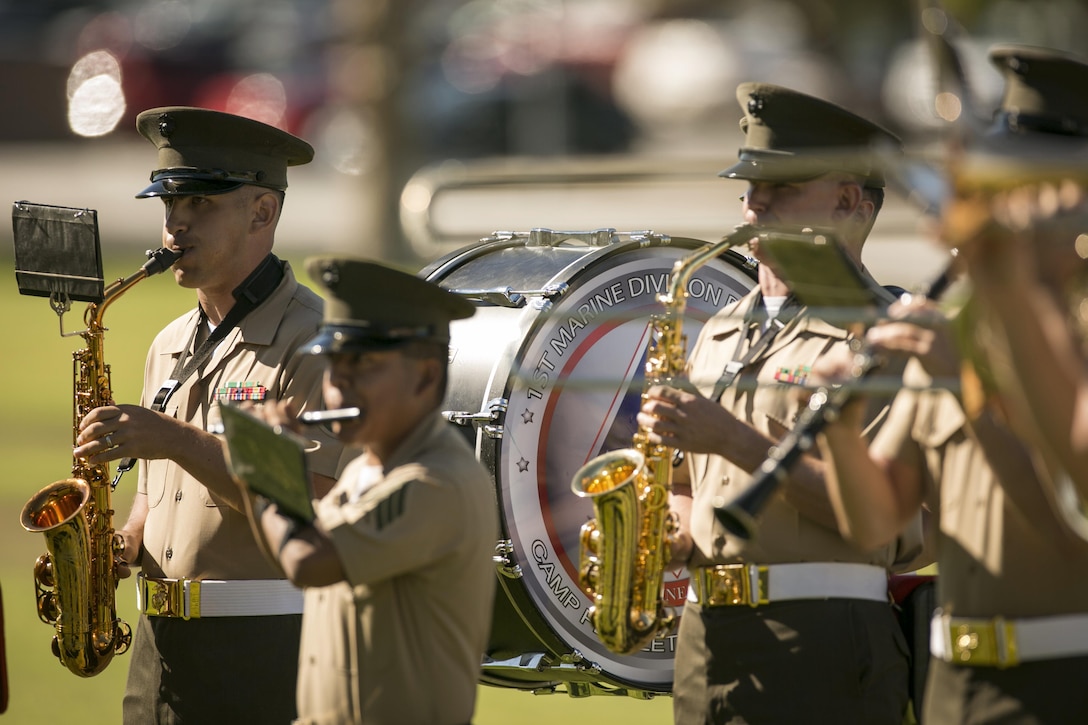 The 1st Marine Division Band plays music before the start of 3rd Battalion, 4th Marines, 7th Marine Regiment’s reactivation ceremony at Lance Cpl. Torrey L. Gray Field, Sept. 17, 2015.