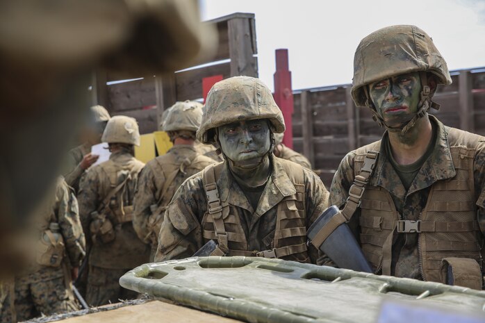 Recruit Julian J. Lara, Kilo Company, 3rd Recruit Training Battalion, listens to a fellow recruit give instructions for an obstacle during the Leadership Reaction Course at Marine Corps Base Camp Pendleton, Calif., Sept. 9.  Following graduation, Lara will attend the School of Infantry for Marine Combat Training in Camp Pendleton, Calif., and after will pursue a career in aviation electronics and plans on trying to commission as an officer sometime in the next few years.  Today, all male recruits recruited from recruiting stations west of the Mississippi are trained at MCRD San Diego. The depot is responsible for training more than 16,000 recruits annually. Kilo Company graduated recruit training Sept. 18.