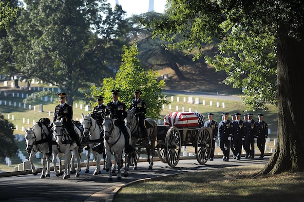 The remains of Capt. Matthew Roland are taken to his funeral service and final resting place at Arlington National Cemetery, Va., Sept. 18, 2015. Roland was fatally wounded in an attack near a vehicle checkpoint at Camp Antonik, a forward operating base in Helmand Province, Afghanistan. Roland was a special tactics officer at the 23rd Special Tactics Squadron, Hurlburt Field, Fla. (U.S. Air Force photo/Staff Sgt. Nichelle Anderson released) 