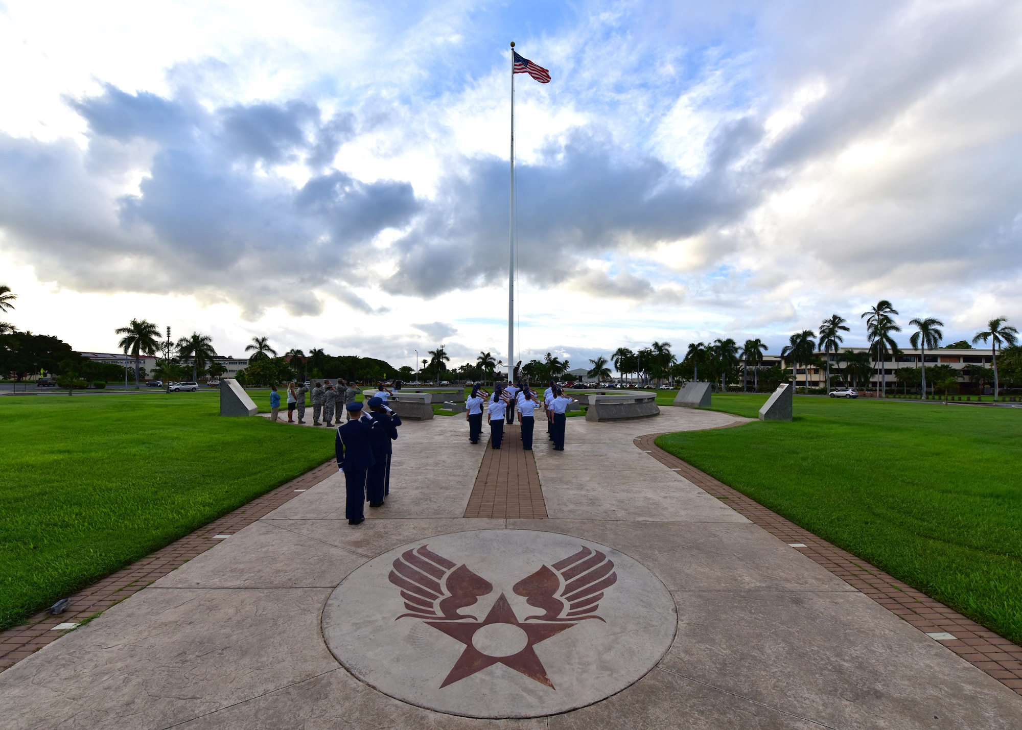 Airmen from the Joint Base Pearl Harbor-Hickam Air Force Sergeant’s Association present arms during a POW/MIA revile ceremony, on JBPHH, Hawaii, Sept. 14, 2015. The ceremony kicks off this year’s POW/MIA week, which honors the 1,627 missing or unaccounted for military members (as of April 2015) in all branches of service. Some of the week’s events will include name readings of those missing or unaccounted for, a remembrance run and a honors and heritage ceremony, held at the Pearl Harbor visitor’s center.  (U.S. Air Force photo by Senior Airman Christopher Stoltz/Released)