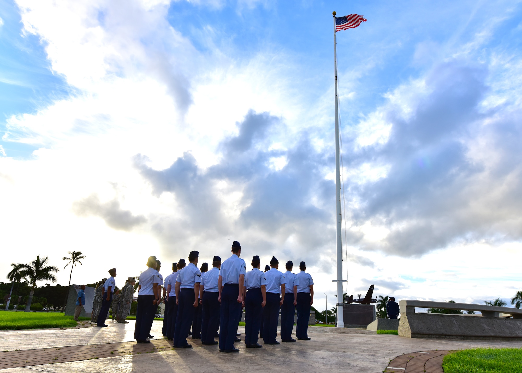 Airmen from the Joint Base Pearl Harbor-Hickam Air Force Sergeant’s Association present arms during a POW/MIA revile ceremony, on JBPHH, Hawaii, Sept. 14, 2015. The ceremony kicks off this year’s POW/MIA week, which honors the 1,627 missing or unaccounted for military members  in all branches of service. Some of the week’s events will include name readings of those missing or unaccounted for, a remembrance run and a honors and heritage ceremony, held at the Pearl Harbor visitor’s center.  (U.S. Air Force photo by Senior Airman Christopher Stoltz/Released)
