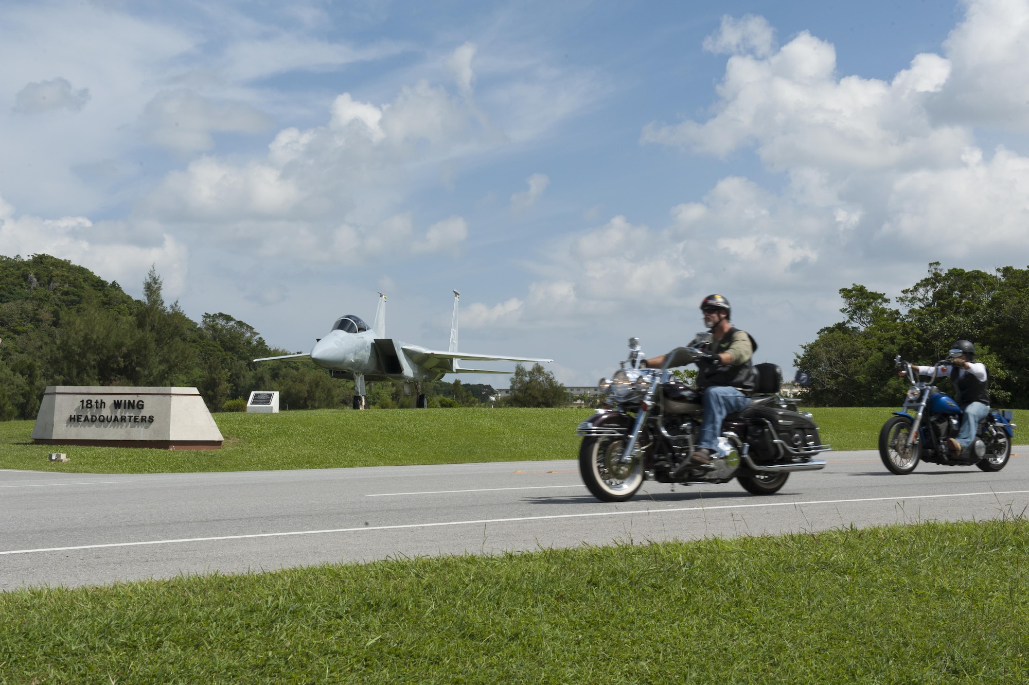 Riders from Kadena’s 2015 Prisoner of War/Missing in Action memorial ride drive past Air Power Park as they exit Kadena Air Base, Japan, on their journey to Cape Zampa, Sept. 18, 2015. Riders came together in support of the memorial ride from not just Kadena Air Base, but surrounding military installations as well. (U.S. Air Force photo by Airman 1st Class Zackary A. Henry/Released)
