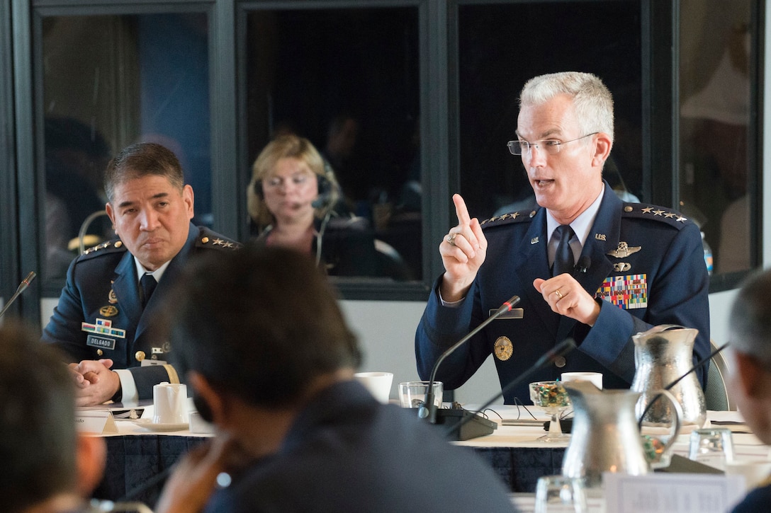 Air Force Gen. Paul J. Selva, vice chairman of the Joint Chiefs of Staff, talks with Pacific allies during a Pacific Air Chief's Symposium in Arlington, Va., Sept. 18, 2015.