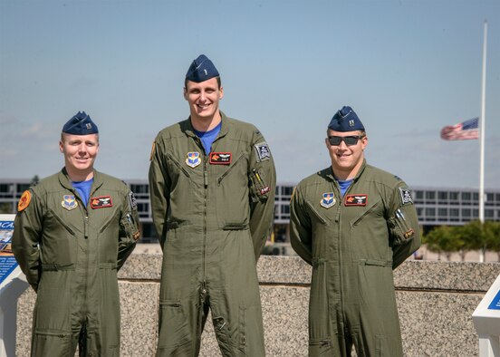 Left to right, Capt. Tyler Ringwald, 1st Lt. Tim Martinelli and Capt. Scott Addy at the U.S. Air Force Academy in Colorado Springs, Colorado, Sept. 11. The instructor pilots, all academy graduates, were part of the 33rd Flying Training Squadron team that flew a “missing man” formation over the campus as part of the school’s Sept. 11 memorial ceremony. (U.S. Air Force photo / David Poe)  