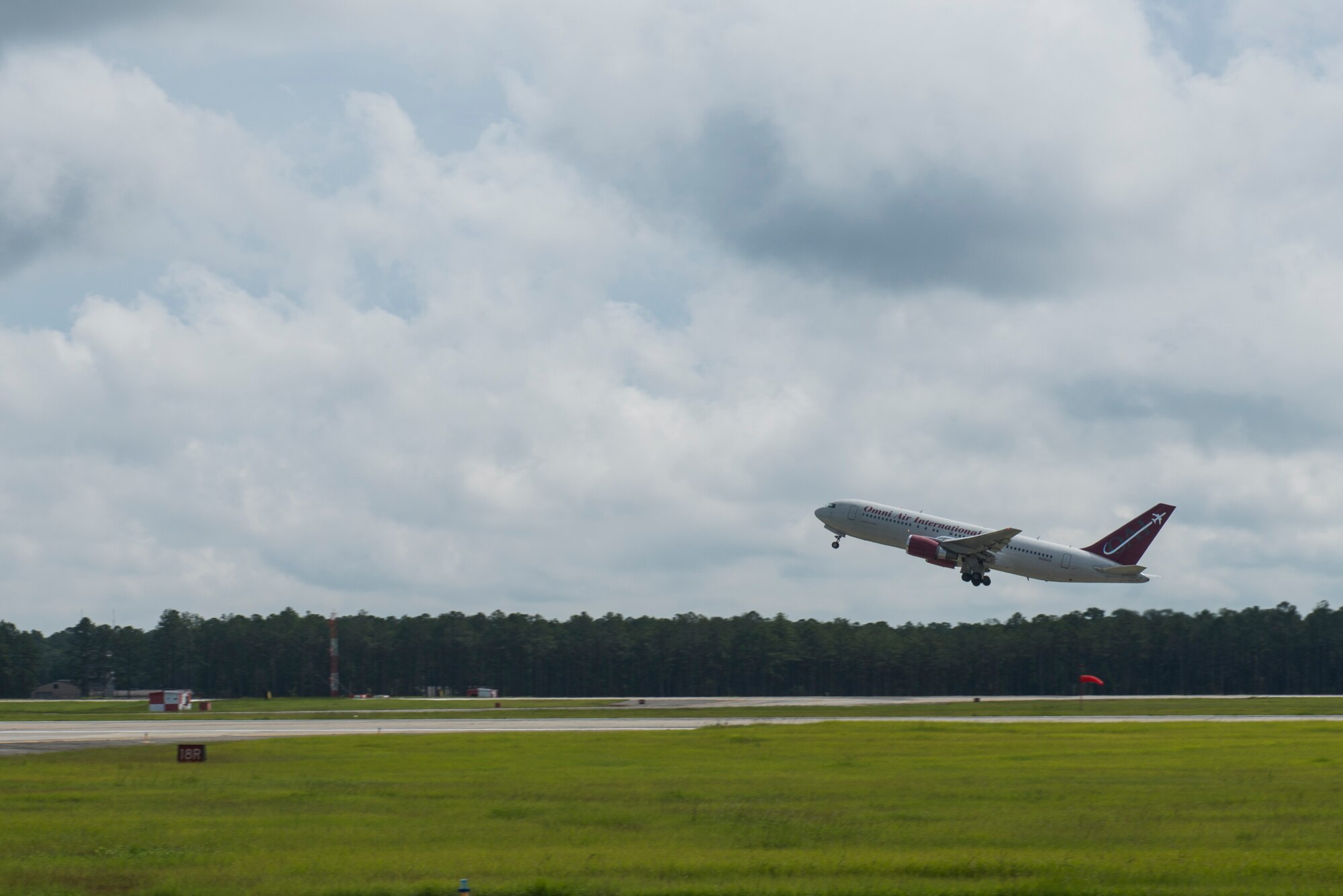 A Boeing 767 holding Moody Airmen takes off for a deployment Sept. 17, 2015, at Moody Air Force Base, Ga. Team Moody deployed more than 150 Airmen to northwest Europe as part of a Theater Security Package. TSPs involve the deployment of rotational forces to showcase the Air Force’s ability to rapidly deploy combat air forces. 