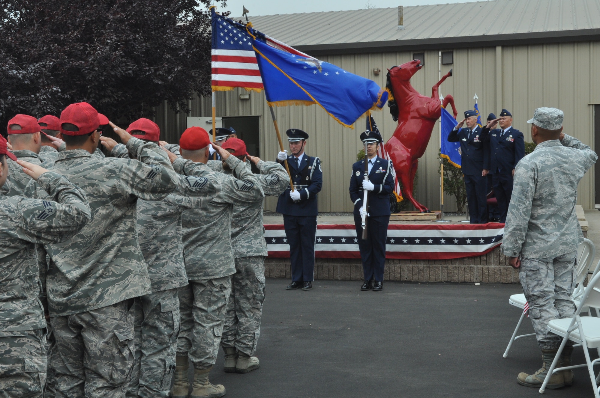 U. S. Air Force Col. Timothy Lamb, 622nd Engineer Group commander, and Maj. Rudolph Bartley 583rd RED HORSE Squadron commander salute during an inactivation ceremony Sept.13, 2015 at Beale Air Force Base, Calif. Air Force Reserve Command inactivated the unit using a strategic planning process to make tough choices in support of higher priority Air Force requirements. (U.S. Air Force photo by Tech. Sgt. Heather Skinkle/Released)
