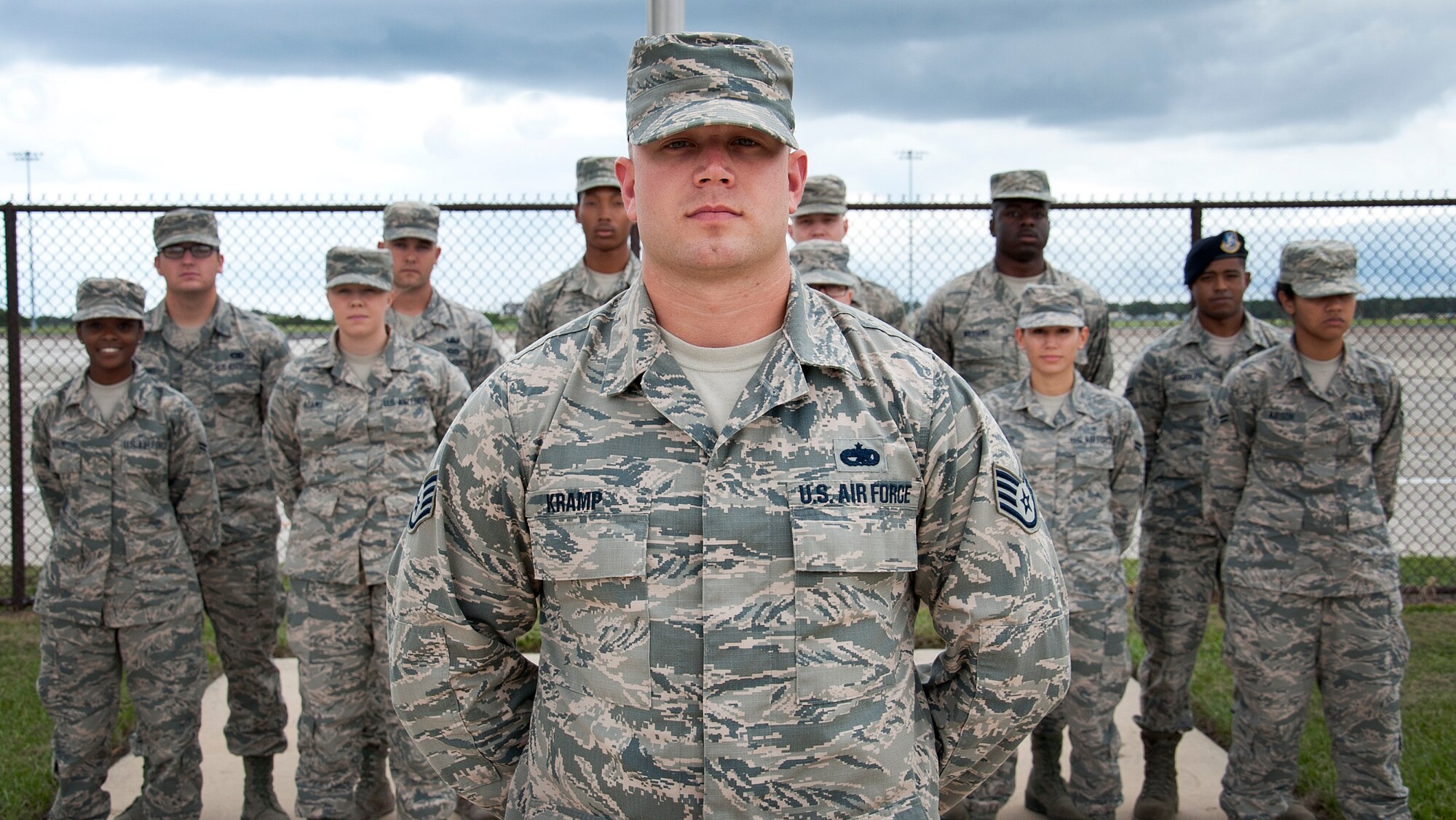 Staff Sgt. Brian Kramp, 6th Maintenance Squadron crew chief and First Term Airmen Class team lead, poses for a group photo with his final FTAC students Sept. 17, 2015, at MacDill Air Force Base, Fla. As the team lead, Kramp is responsible for building and setting up the schedule for the course, as well as creating class rosters for FTAC and all other professional development courses. (U.S. Air Force photo by Senior Airman Jenay Randolph/Released)