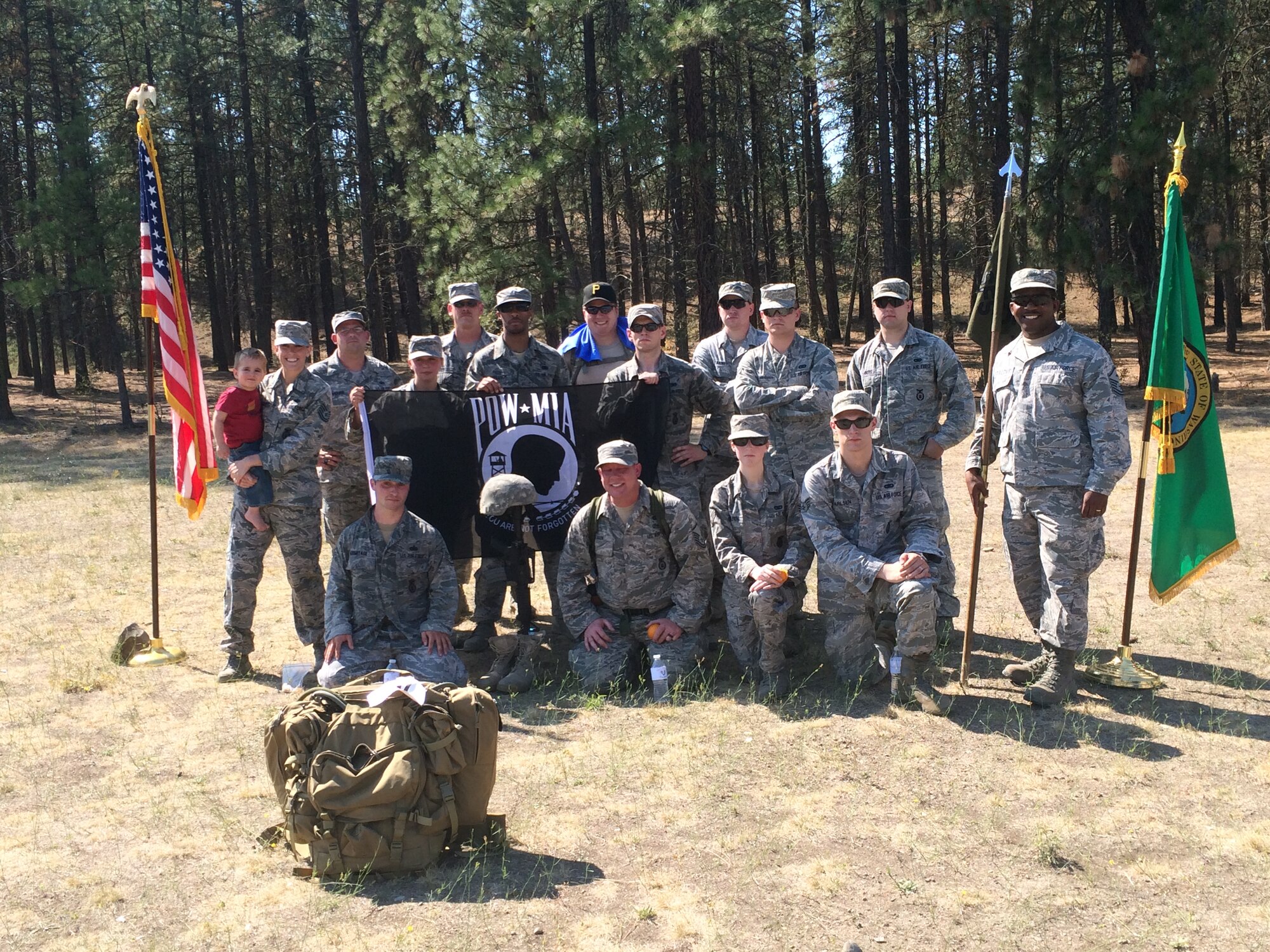 Members from the 92nd Security Forces Squadron gather for a photo before conducting a nine-mile ruck at the March for the Fallen event Sept. 12, 2015, in Northwest Spokane, Wash. March for The Fallen honors all fallen Soldiers from Washington State regardless of what branch of the Military they chose to serve in and donates all the proceeds that are raised to local Veterans groups throughout Washington State. (U.S. Air Force photo/courtesy photo)