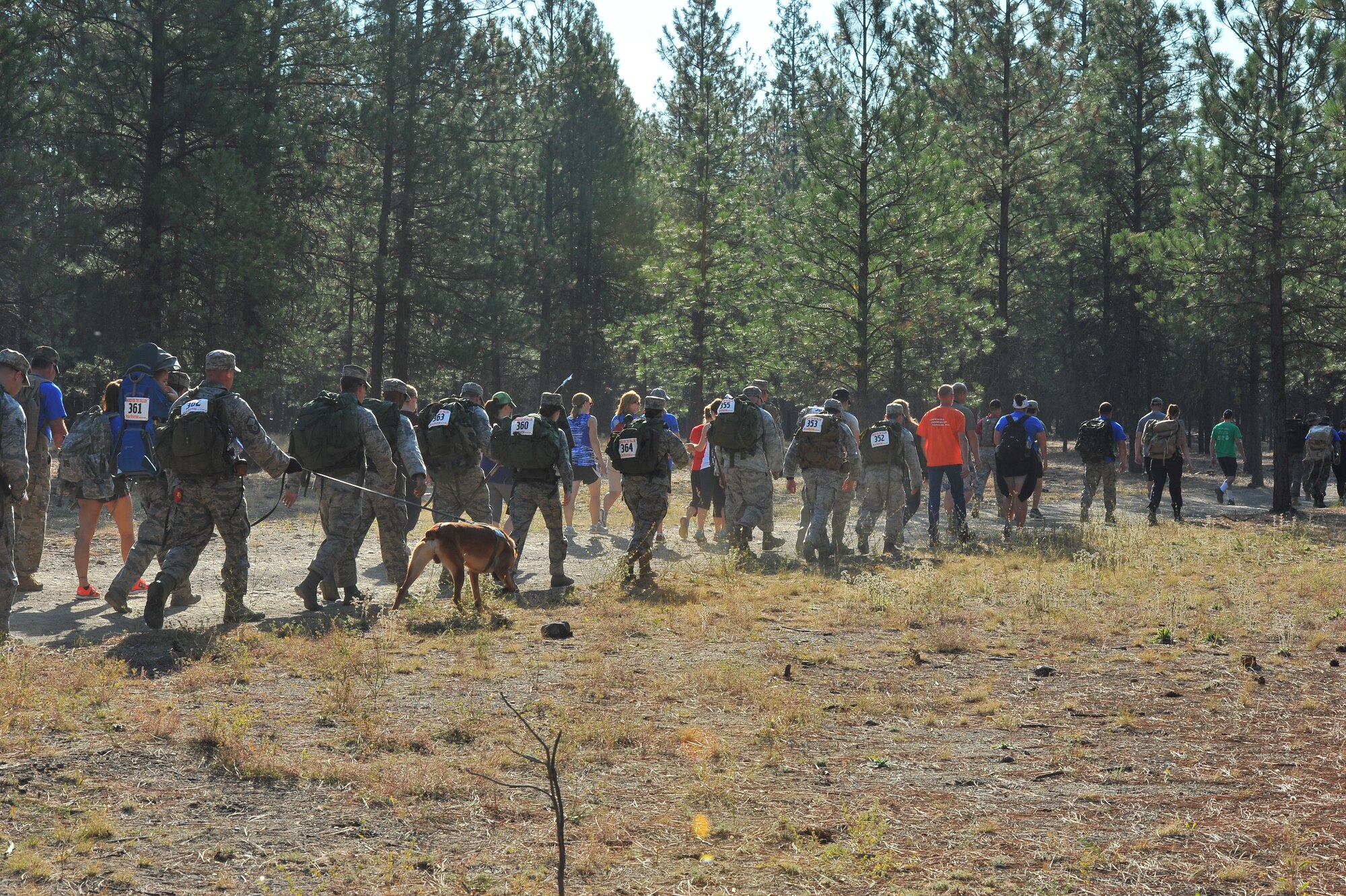 Members from the 92nd Security Forces Squadron participate in a nine-mile ruck hike at the March for the Fallen event Sept. 12, 2015, in Northwest Spokane, Wash. Since September 11, 2001 there have been 150 Military members from Washington State who have been killed in action while serving our country from all the branches of the military. (U.S. Air Force photo/Staff Sgt. Veronica Montes)