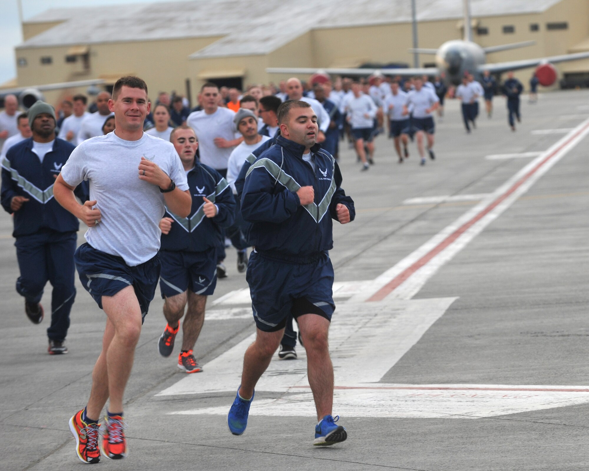 Fairchild Airmen participate in a prisoner of war and missing in action wing run Sept. 18, 2015 at Fairchild Air Force Base, Wash. Wing runs allow Airmen to personally assess their physical fitness and enhance unit cohesion through team morale and welfare. (U.S. Air Force photo/Staff Sgt. Samantha Krolikowski)
