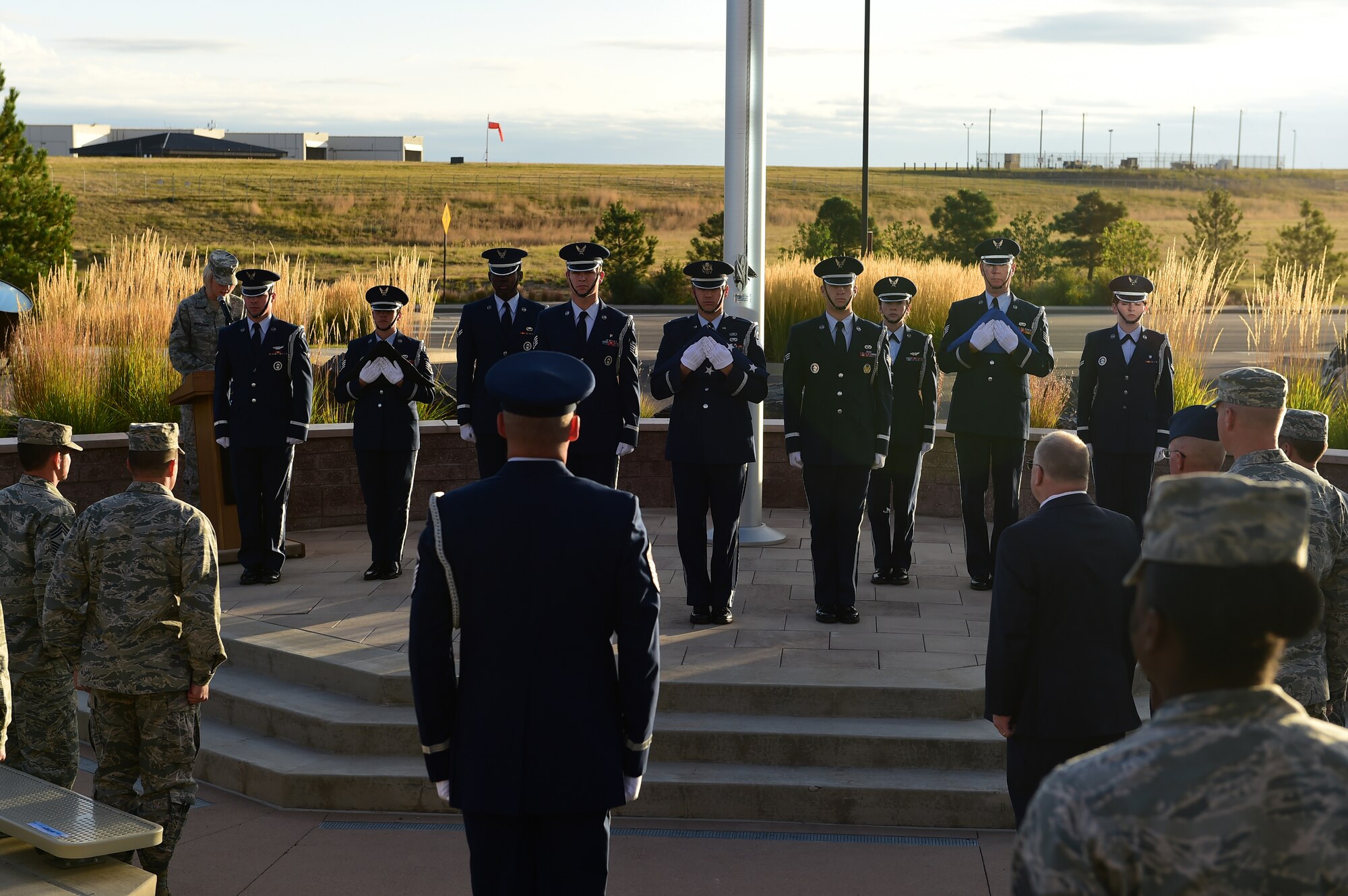 Team Buckley honored military prisoners of war and those missing in action during a ceremony Sept. 18, 2015, on Buckley Air Force Base, Colo. The ceremony recognized those who have had to endure enemy captivity and those who never made it back home after a conflict. The guest of honor retired Tech. Sgt. Jasper Page was a POW, during the Vietnam War but escaped captivity and was able to make it back to American positions safely. (U.S. Air Force photo by Airman 1st Class Luke W. Nowakowski/Released)