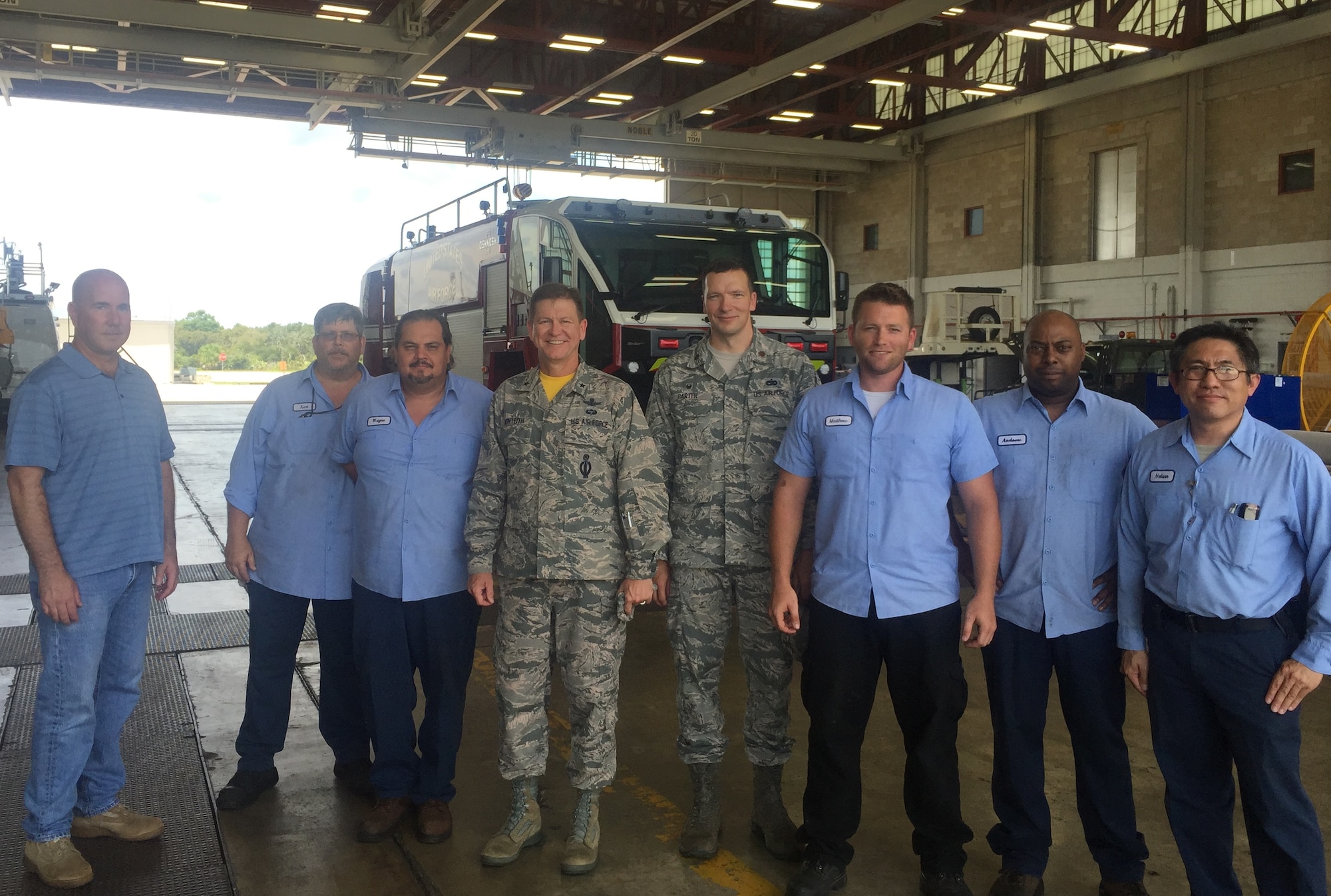 Brig. Gen. Wayne Monteith, 45th Space Wing commander, takes some time out to visit with members of the 45th Logistics Readiness Squadron vehicle personnel Sept. 3, 2015, at Patrick Air Force Base, Florida. (Courtesy photo)