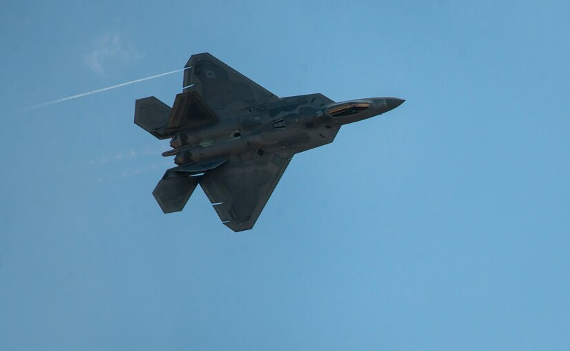 An F-22 Raptor flies over Joint Base Andrews, Md., during an air show rehearsal Sept. 18, 2015. The U.S. Air Force holds air shows to inspire patriotism and demonstrate air superiority to the local community. (U.S Air Force photo by Airman 1st Class Philip Bryant/Released)