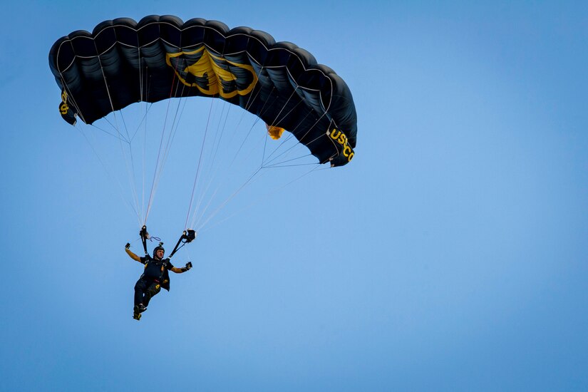 A member of the U.S. Special Operations Para-Commandos parachutes during the rehearsal day prior to the 2015 Andrews Air Show at Joint Base Andrews, Md., Sept. 18, 2015. The Para-Commandos and other performers can be seen at the 2015 AAS on Sept. 19, 2015. (U.S. Air Force photo/Airman 1st Class Ryan J. Sonnier)