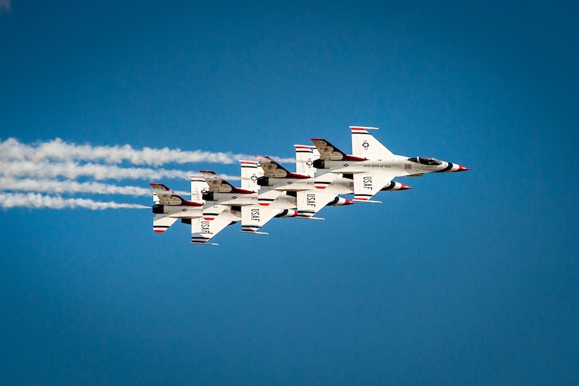 U.S. Air Force Thunderbirds perform during the rehearsal day prior to the 2015 Andrews Air Show at Joint Base Andrews, Md., Sept. 18, 2015. The Thunderbirds will be the headlining performers for the 2015 AAS on Sept. 19, 2015. (U.S. Air Force photo/Airman 1st Class Ryan J. Sonnier)