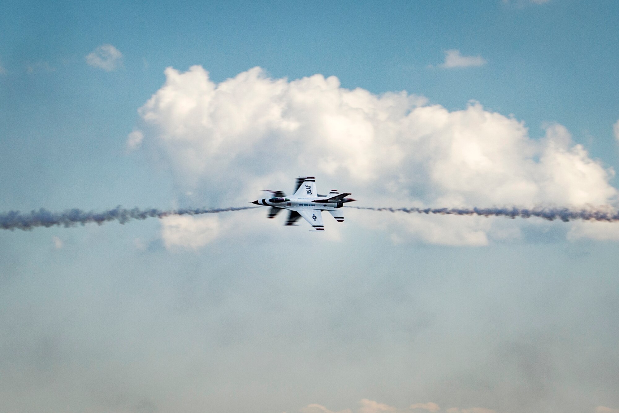 U.S. Air Force Thunderbirds perform during the rehearsal day prior to the 2015 Andrews Air Show at Joint Base Andrews, Md., Sept. 18, 2015. The Thunderbirds will be the headlining performers for the 2015 AAS on Sept. 19, 2015. (U.S. Air Force photo/Airman 1st Class Ryan J. Sonnier)