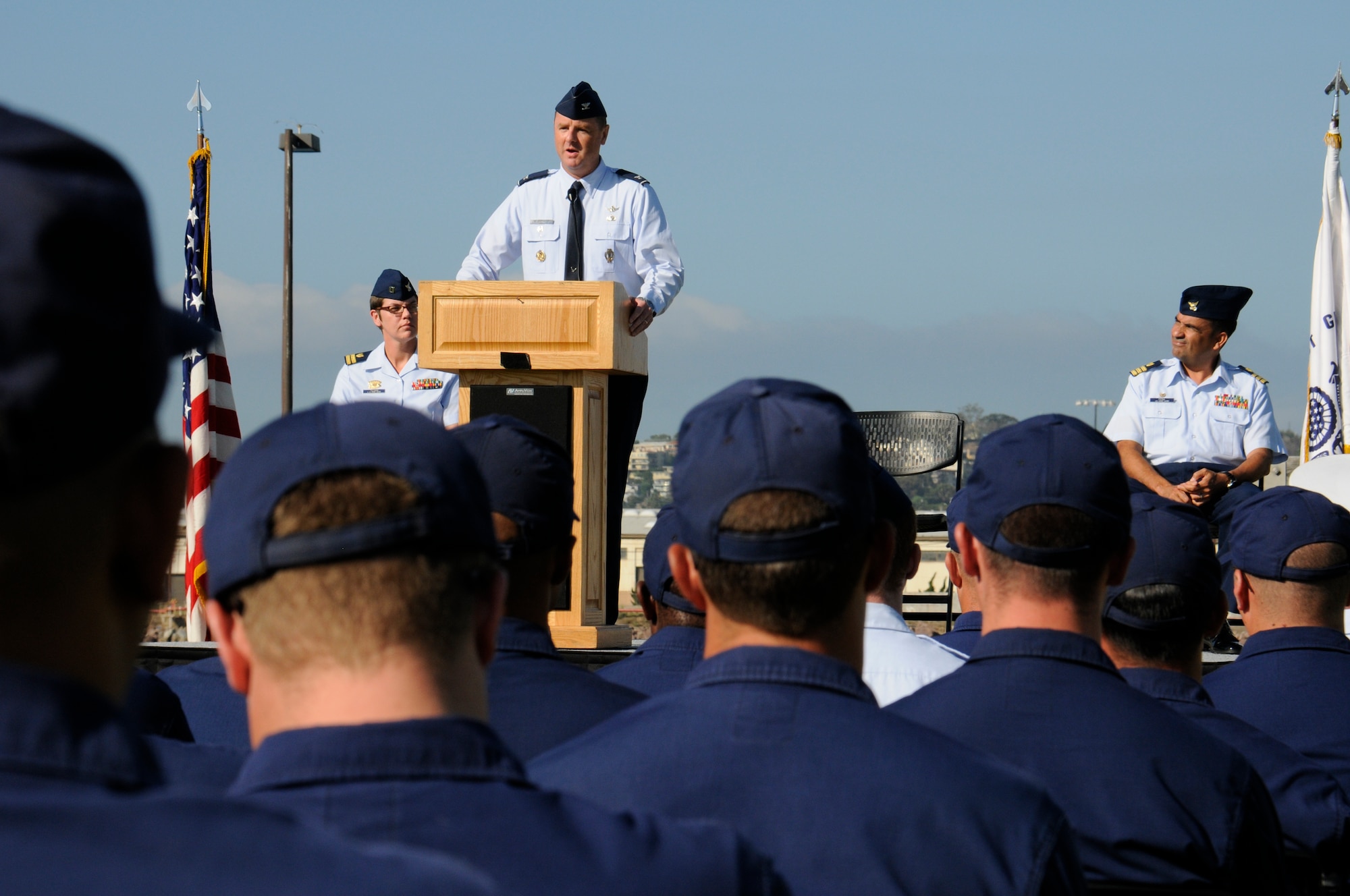 Col. Gerard Gleckel, Jr., deputy director of SMC’s Global Positioning Directorate at Los Angeles AFB in El Segundo, addresses audience at the POW/MIA torch relay ceremony Sept. 17 as Cmdr. Jose A. Pena, right, commanding officer of U.S. Coast Guard Base Los Angeles-Long Beach and Lt. Lori Tillman, department head of the Health, Safety and Work-Life Service Center listen. (U.S. Air Force photo/Joe Juarez)