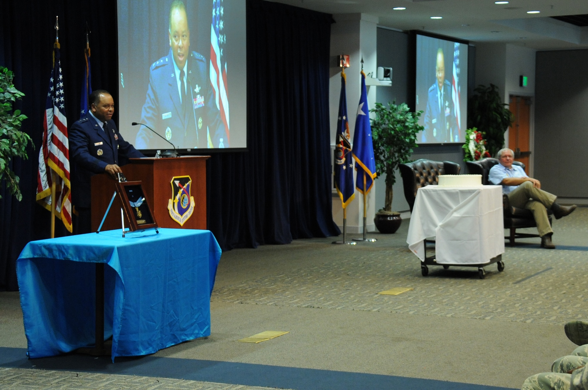 Lt. Gen. Samuel Greaves, SMC commander and Air Force Program Executive Officer for Space, addresses the audience inside the Schriever Space Complex's Gordon Conference Center during a celebration of the Air Force's 68th Birthday Sept. 18 at the Space and Missile Systems Center, Los Angeles Air Force Base in El Segundo, Calif. (U.S. Air Force photo/Van De Ha)