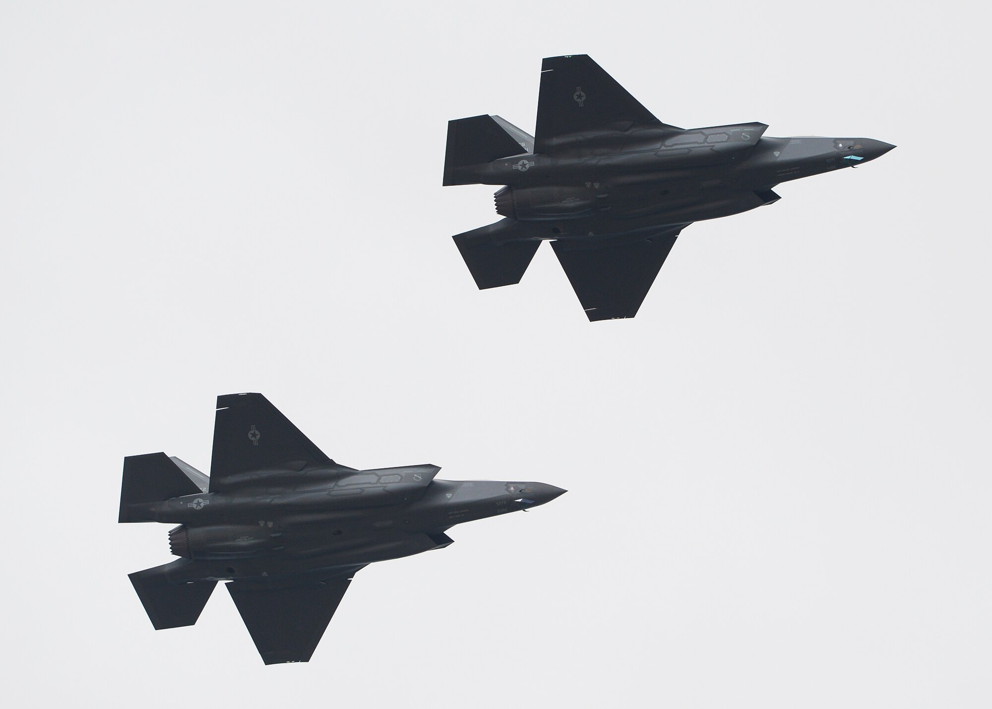 34th Fighter Squadron Commander Lt. Col. George Watkins and Maj. Brad Matherne, 34th FS assistant director of operations, return to Hill Air Force Base, Utah, Sept. 17, after completing the first sorties with the recently acquired, combat-coded F-35A Lightning II aircraft. Both pilots were conducting mission qualification training, focusing on weapons employment, range familiarization and mission system proficiency. (U.S. Air Force photo/Alex R. Lloyd)