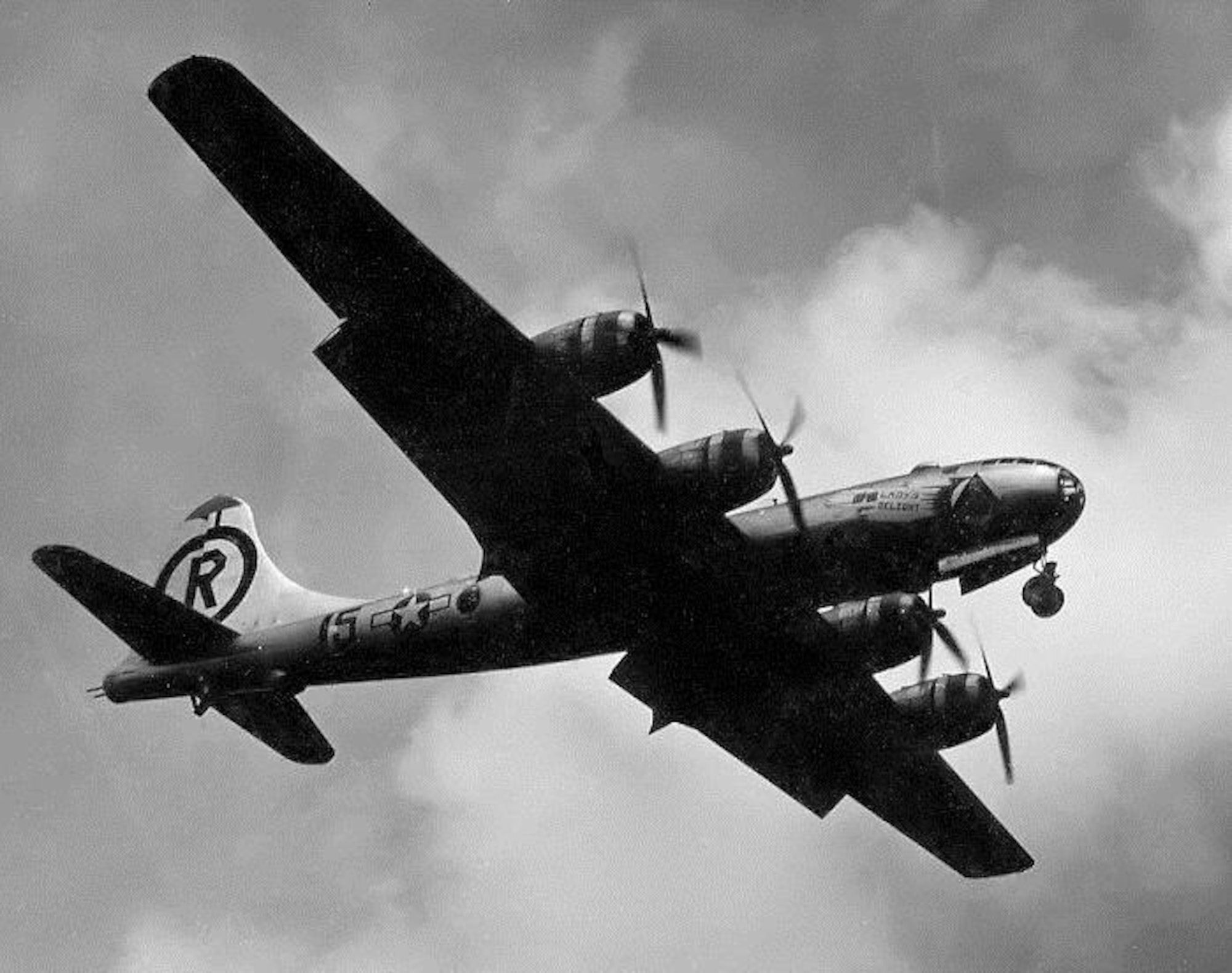 The only known photograph of 24th Bomb Squadron B-29-45-BW, serial number 42-24759, “Blind Date/Lady’s Delight” in flight.  This aircraft was named Blind Date on the left side and had a second name added later, Lady’s Delight, on the right side.  It may have been the only plane in the group to carry two names at the same time.  (Courtesy 6th Bomb Group Association)