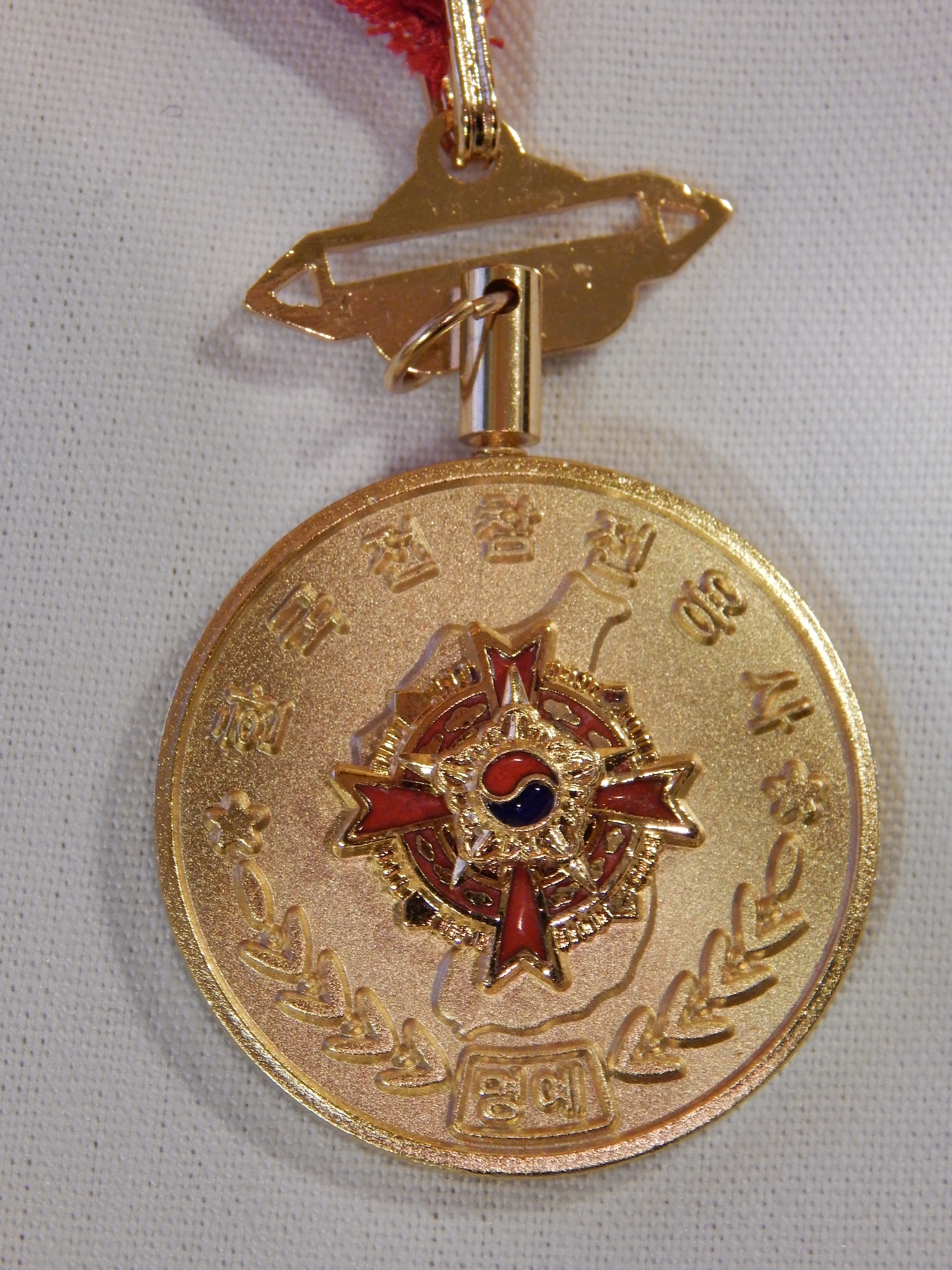 The Korean Ambassador for Peace Medal is awarded to veterans who served during the Korean War from June 25, 1950, to July 27, 1953.   Veterans who served in United Nations peacekeeping operations until the end of 1955 and U.S. Navy members who served aboard Navy vessels in Korean waters from 1950 to 1953 are also eligible for the commemorative medals. (U.S. Air Force photo/Christine Spargur)
