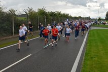 Team Mildenhall Airmen start their monthly 5k run Sept. 18, 2015, on RAF Mildenhall, England. This month’s 5k was held in recognition of POW MIA Recognition Day and the Air Force’s 68th birthday. (U.S. Air Force photo by Staff Sgt. Micaiah Anthony/Released) 