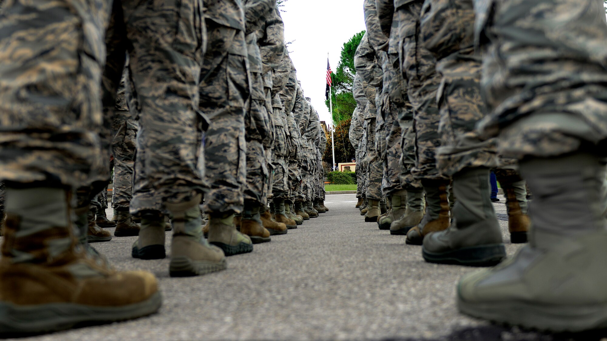 U.S. Air Force Airmen stand in formation during the Prisoner of War/Missing in Action Remembrance Week retreat ceremony Sept. 17, 2015, at Aviano Air Base, Italy. The Air Force Sergeants Association hosted several events during the week, including a vigil run and table ceremony to remember fellow service members. (U.S. Air Force photo by Senior Airman Areca T. Bell/Released)