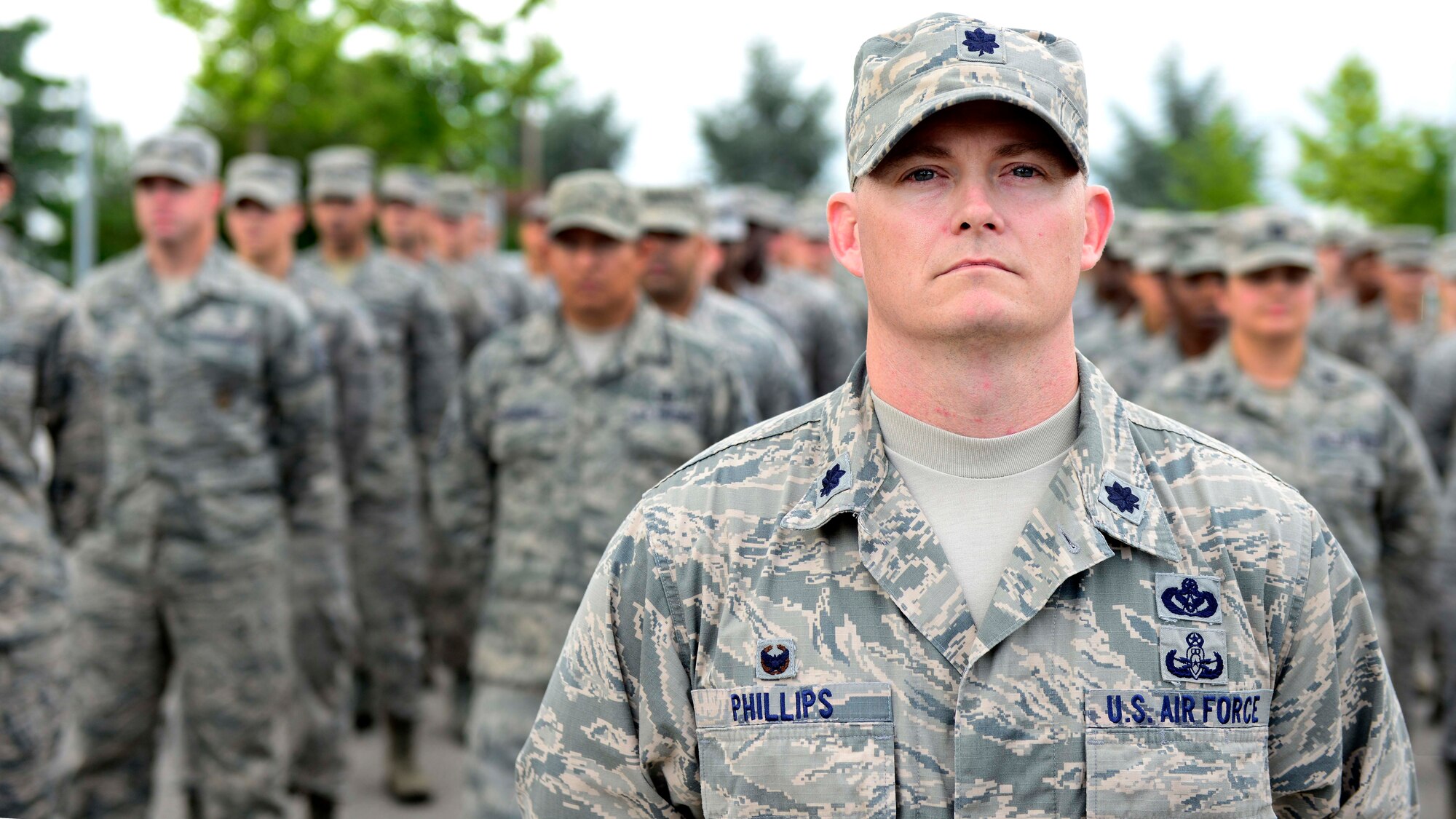 U.S. Air Force Lt. Col. Dennis Phillips, 31st Civil Engineer Squadron commander, leads a formation of Airmen during the Prisoner of War/Missing in Action Remembrance Week retreat ceremony Sept. 17, 2015, at Aviano Air Base, Italy. According to the Defense POW/MIA Accounting Agency, there are still 83,114 service members, since World War II, who are unaccounted for. (U.S. Air Force photo by Senior Airman Areca T. Bell/Released)