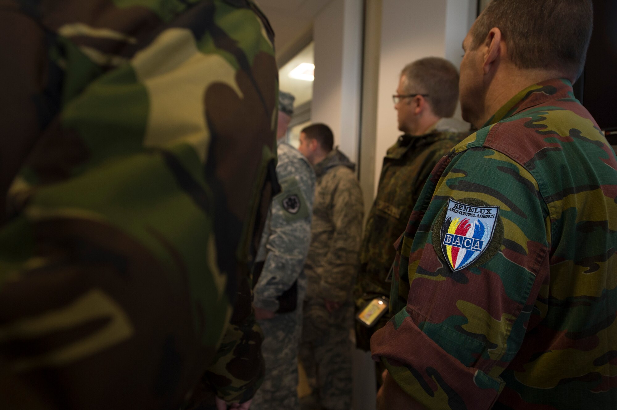 Inspectors from the Conventional Armed Forces in Europe treaty verification team walk through buildings during an exercise at Spangdahlem Air Base, Germany, Sept. 16, 2015. CFE inspections allow foreign countries to conduct an on-site inspection of U.S. installations. The inspections verify that the U.S. remains in compliance with treaty limits on equipment like tanks, armored-combat vehicles, heavy artillery, combat aircraft and attack helicopters. (U.S. Air Force photo by Staff Sgt. Christopher Ruano/Released)